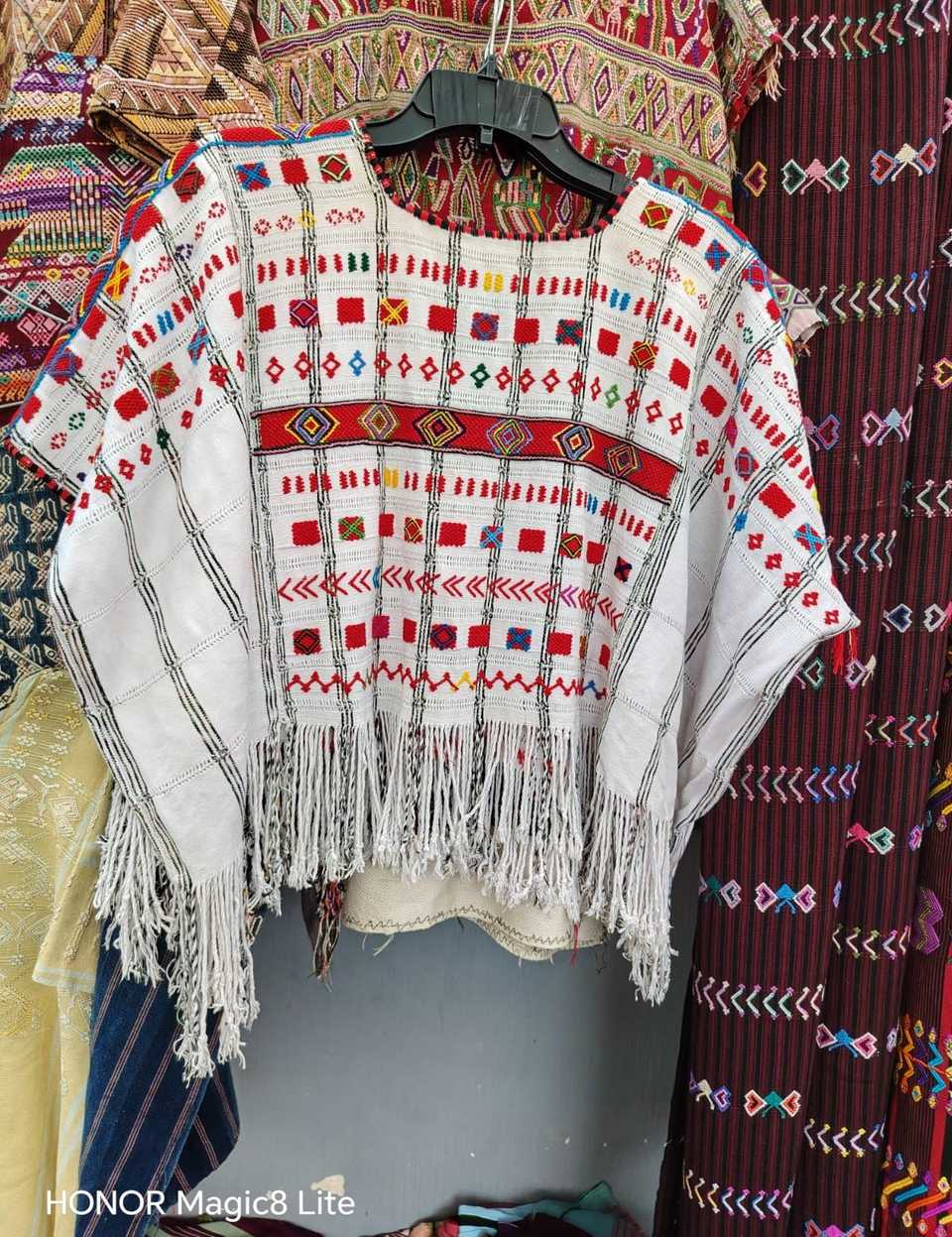Red on white Colotenango huipil #5-332