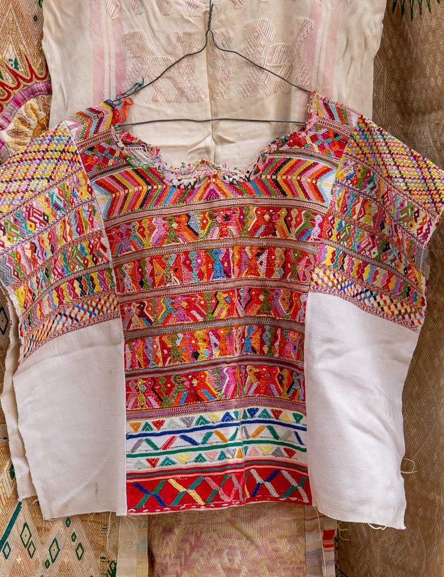 Red and white San Juan Cotzal huipil #4-147