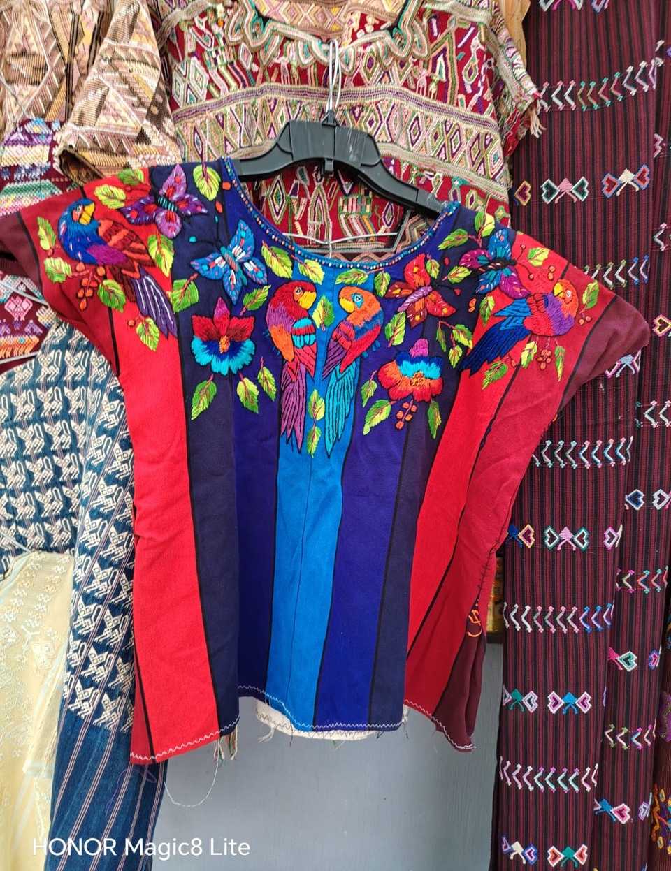 Red and blue parrot Santiago huipil #5-307