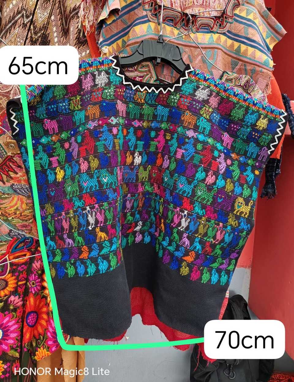 Black with animal motifs Coban huipil #5-184