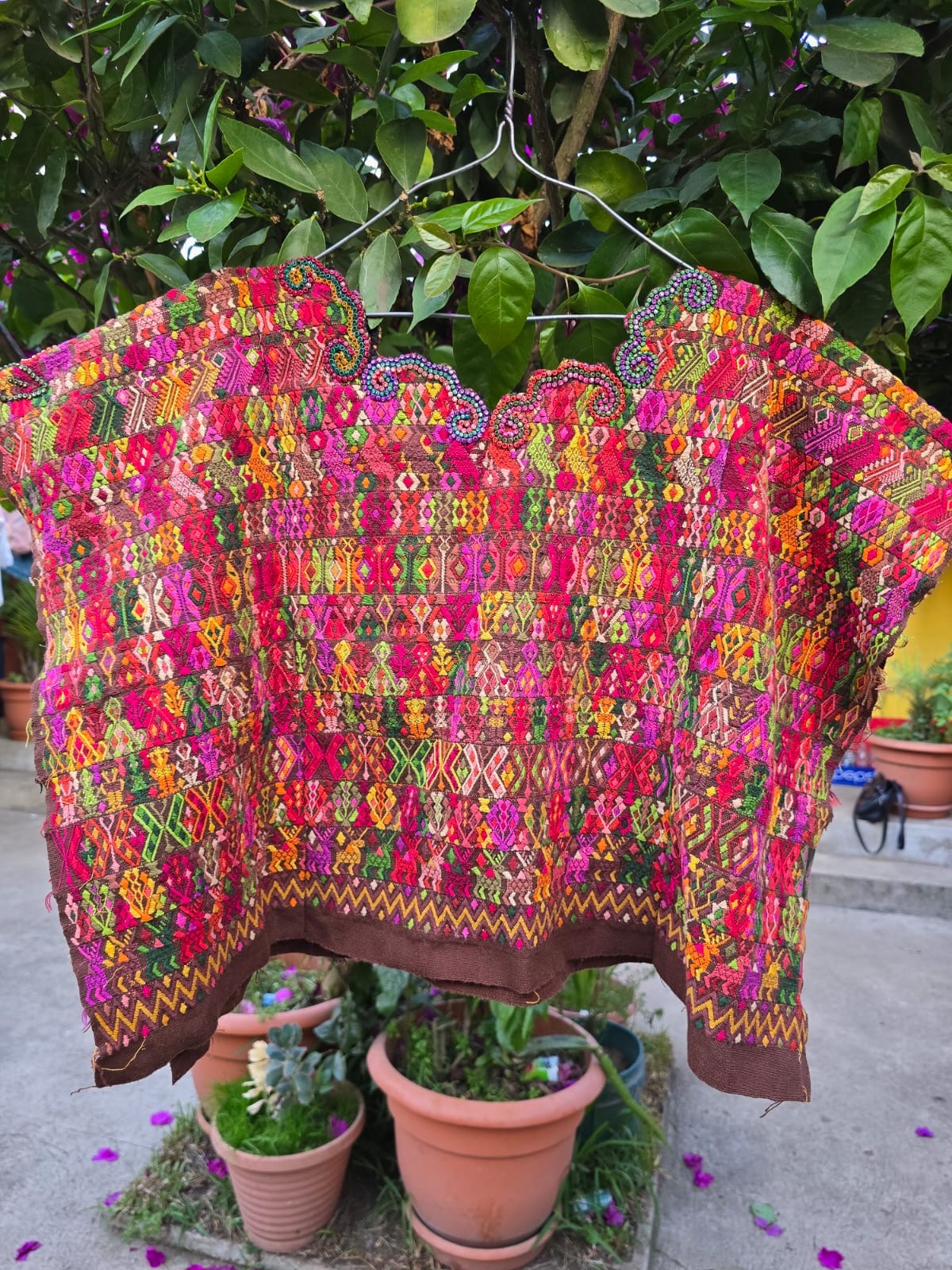 (Reserved for April) Colourful on brown Coban huipil