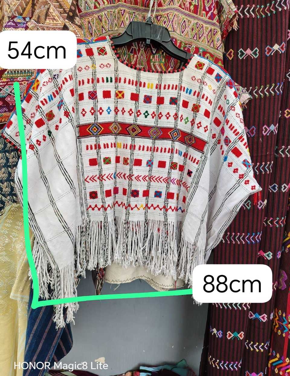 Red on white Colotenango huipil #5-332