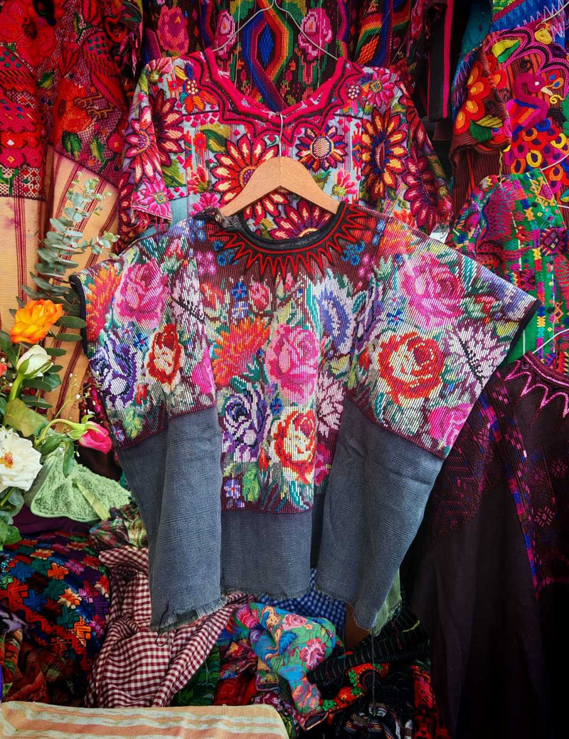 Colourful on black Chichicastenango huipil #6-23
