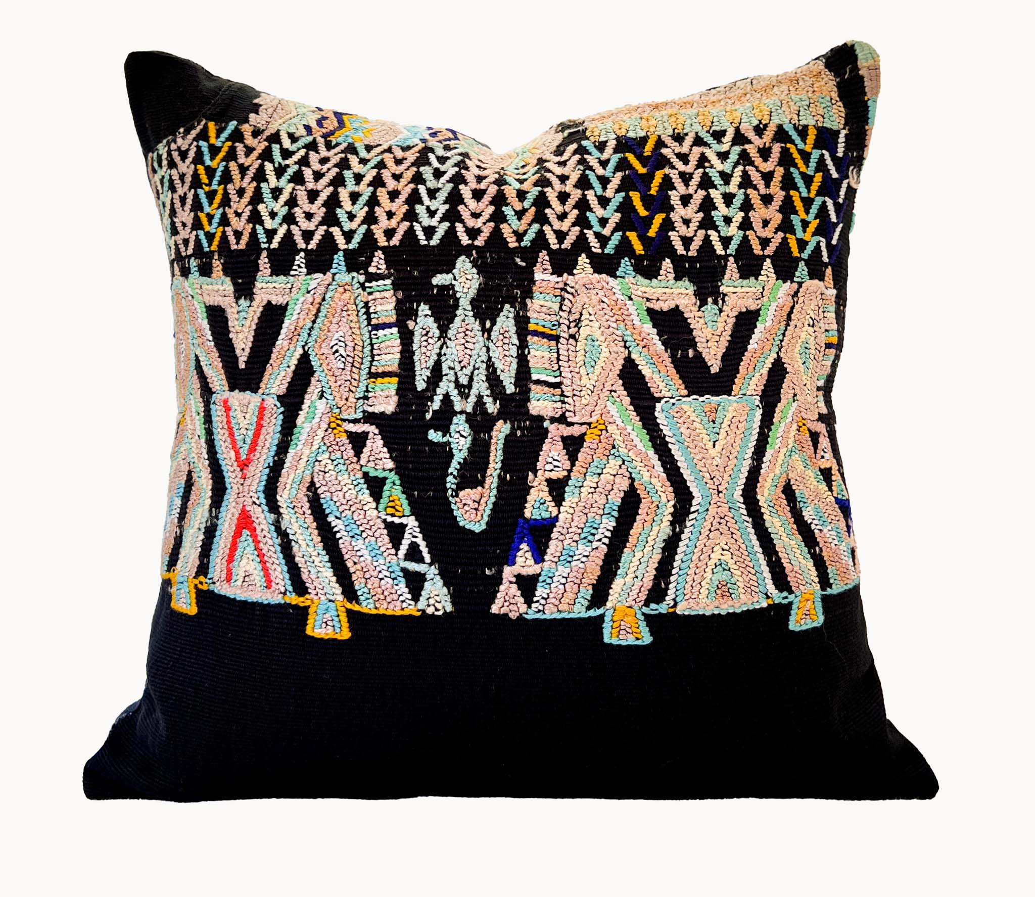 Embroidered Guatemalan huipil textile repurposed into a pillow