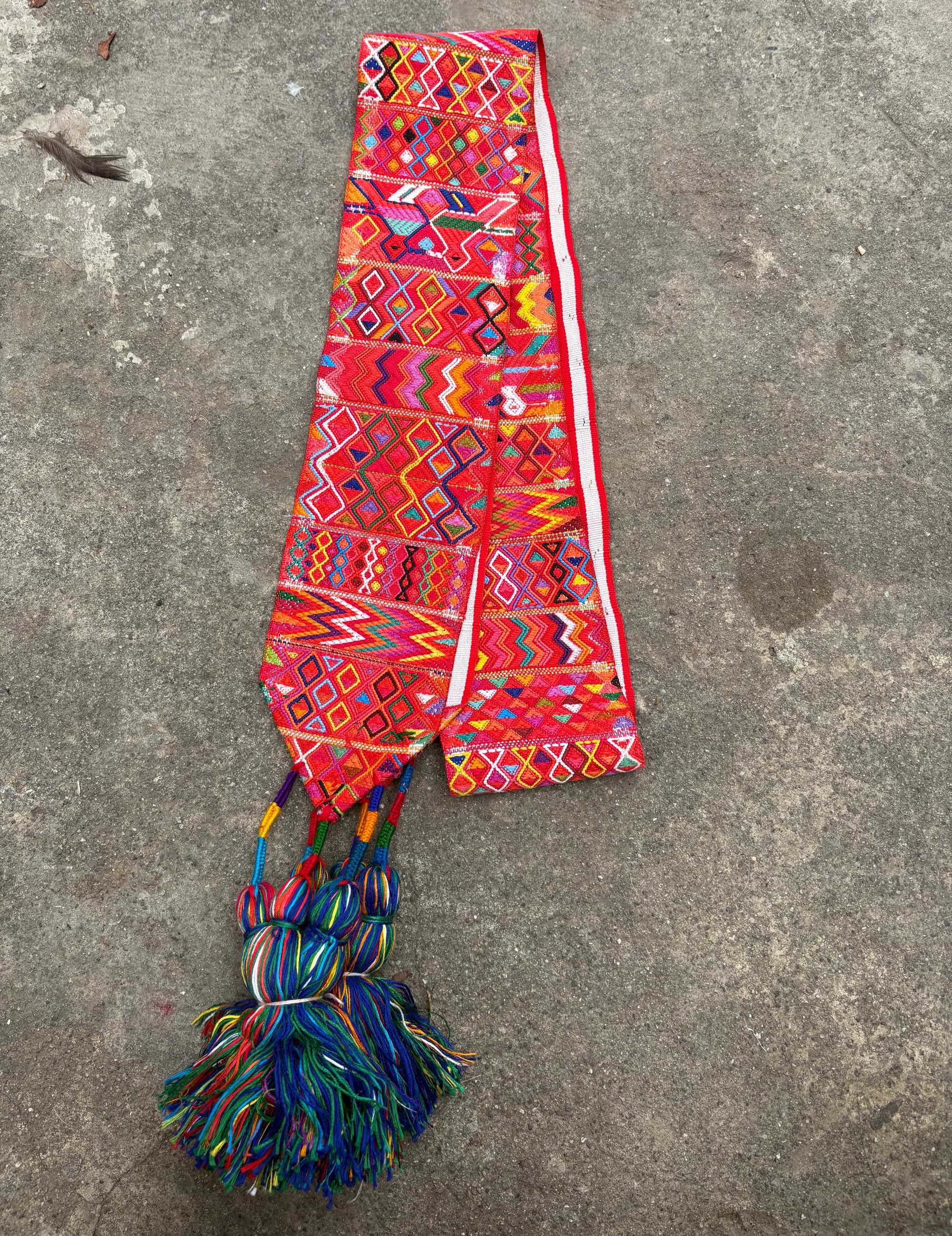 (Reserved for Andrea) Colourful on red with blue tassels Nebaj tocoyal #6-139