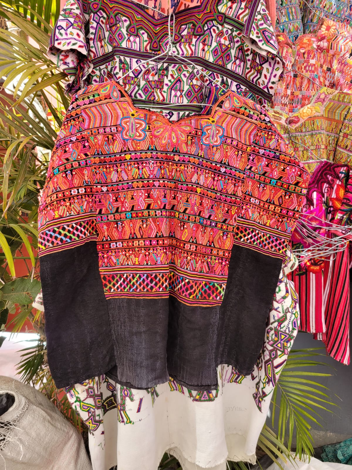 Pink and black San Juan Cotzal huipil for April