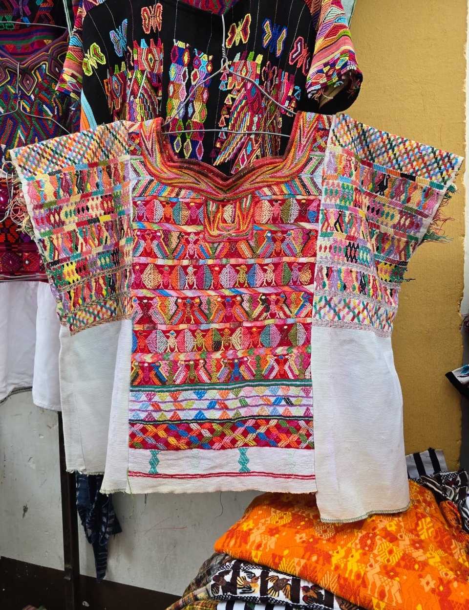 Red and white San Juan Cotzal huipil #5-96