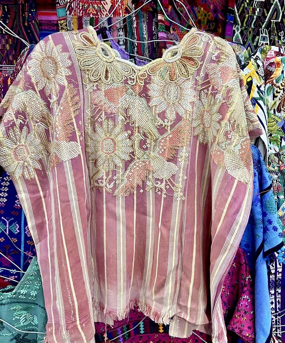 Pink striped Chichi huipil with cream and coral birds and flowers