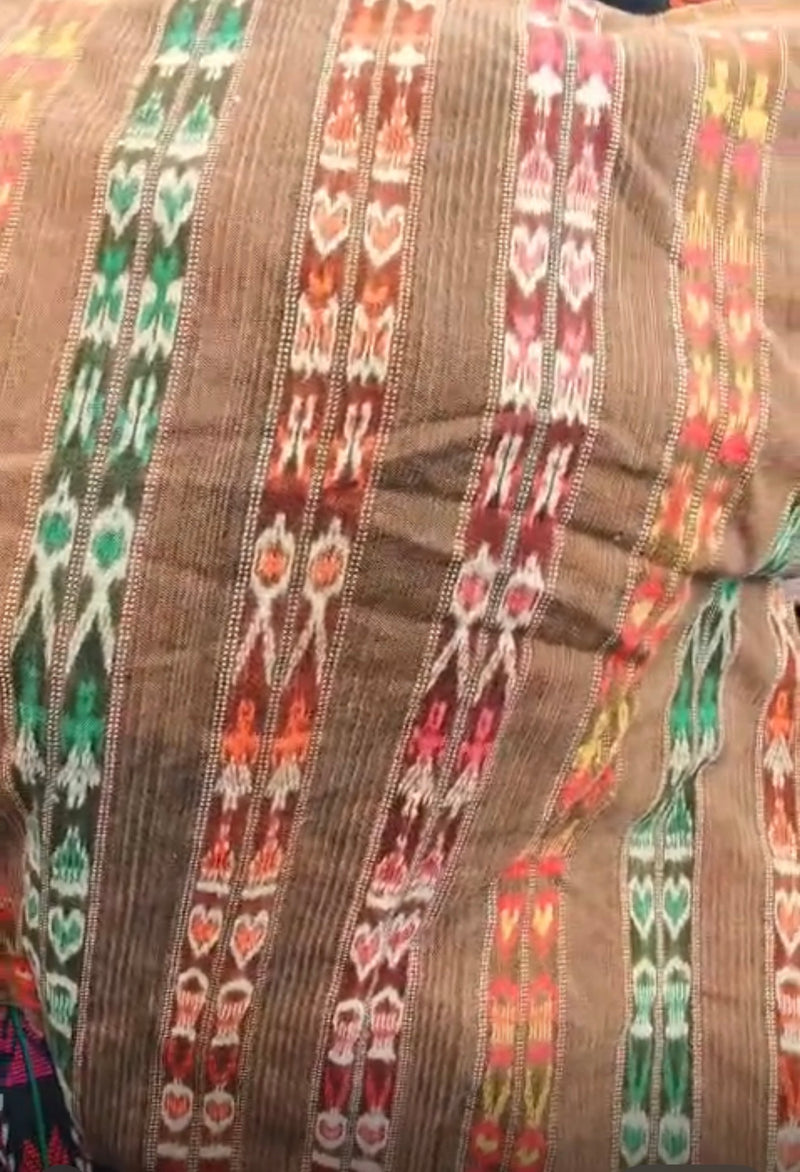 Brown and colorful ikat corte for April
