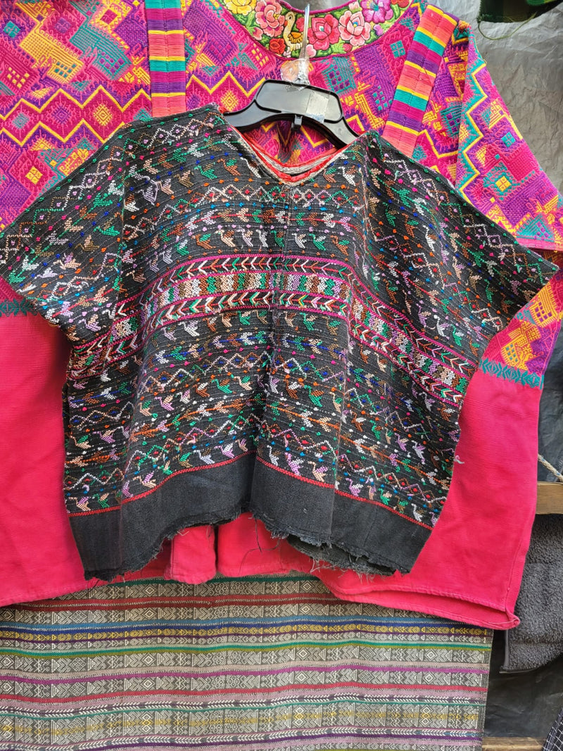 Black San Lucas huipil for April