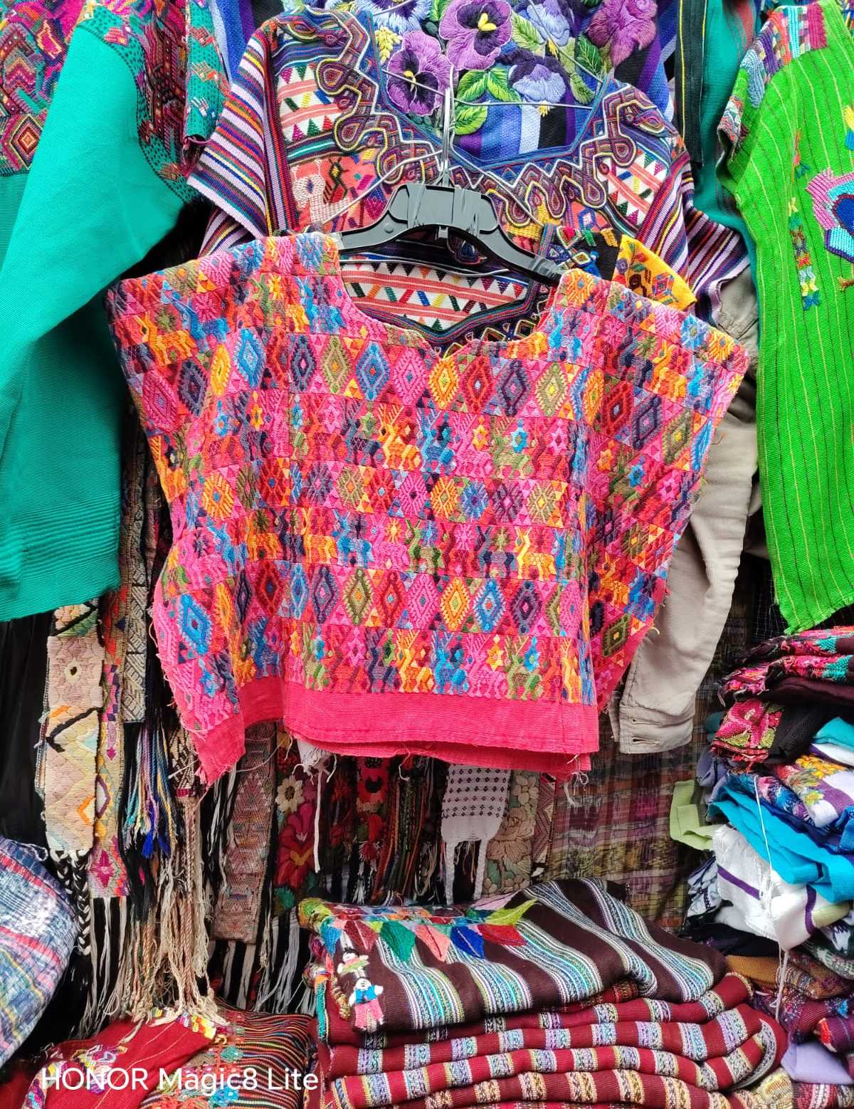 Colourful on pink Coban huipil #4-111