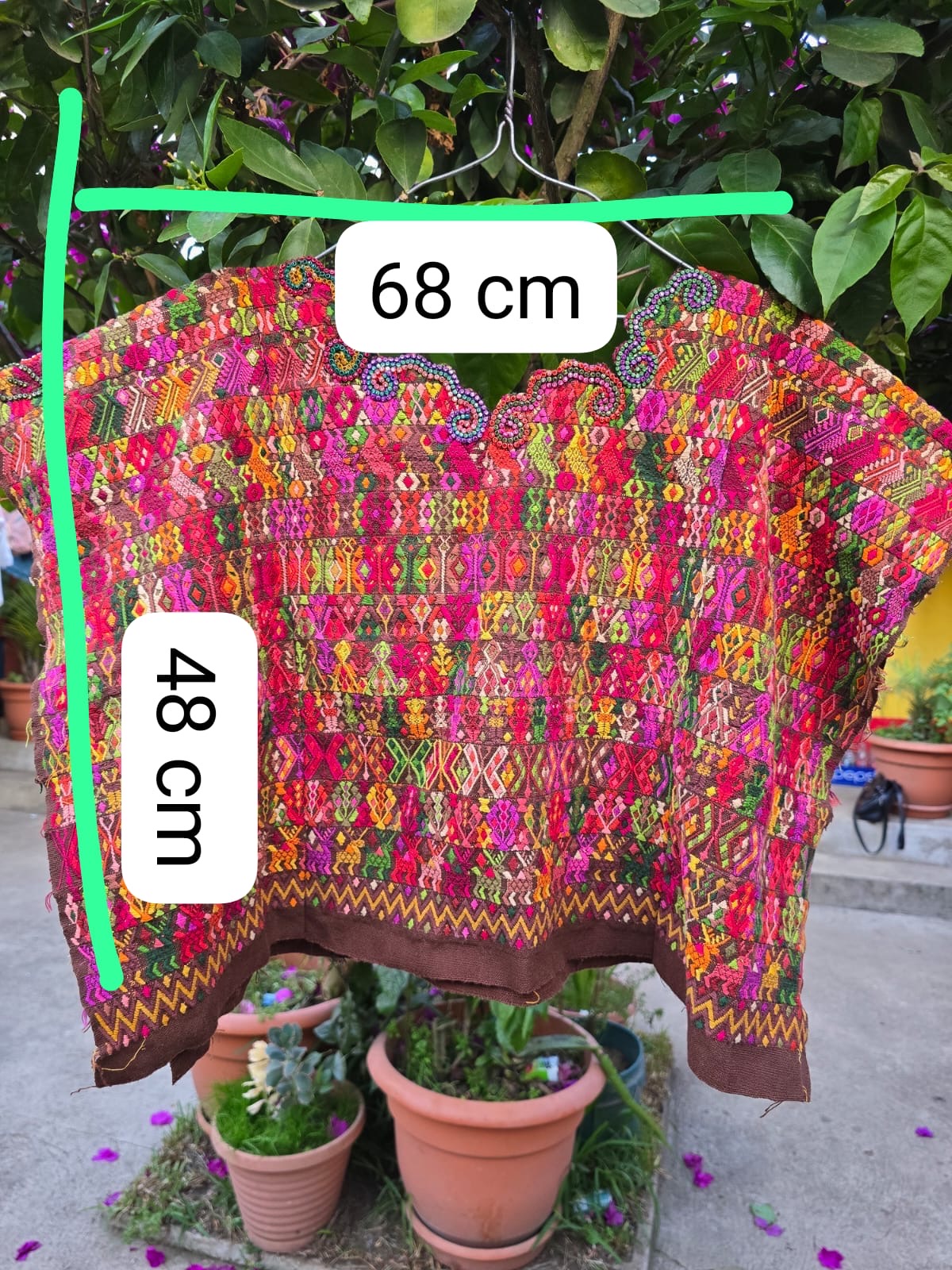 (Reserved for April) Colourful on brown Coban huipil