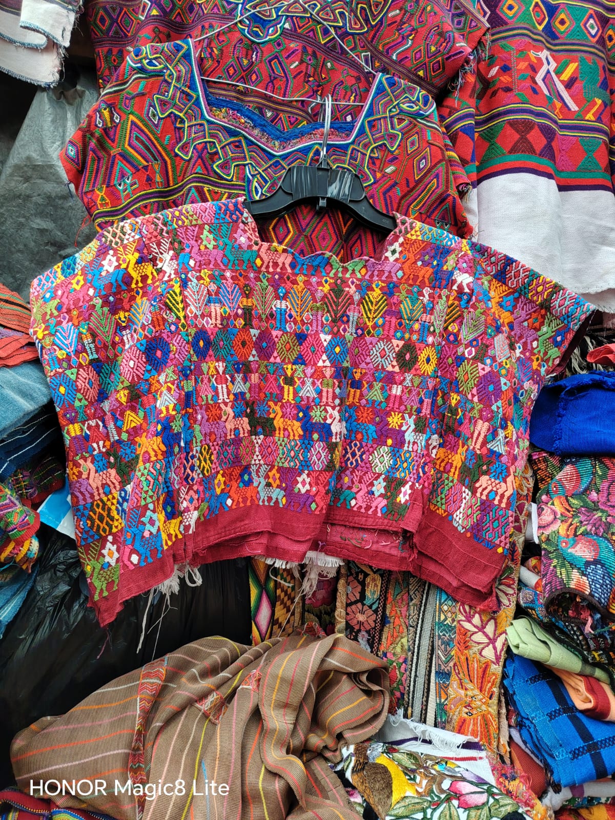 Colorful on red Coban huipil (Reserved for April)