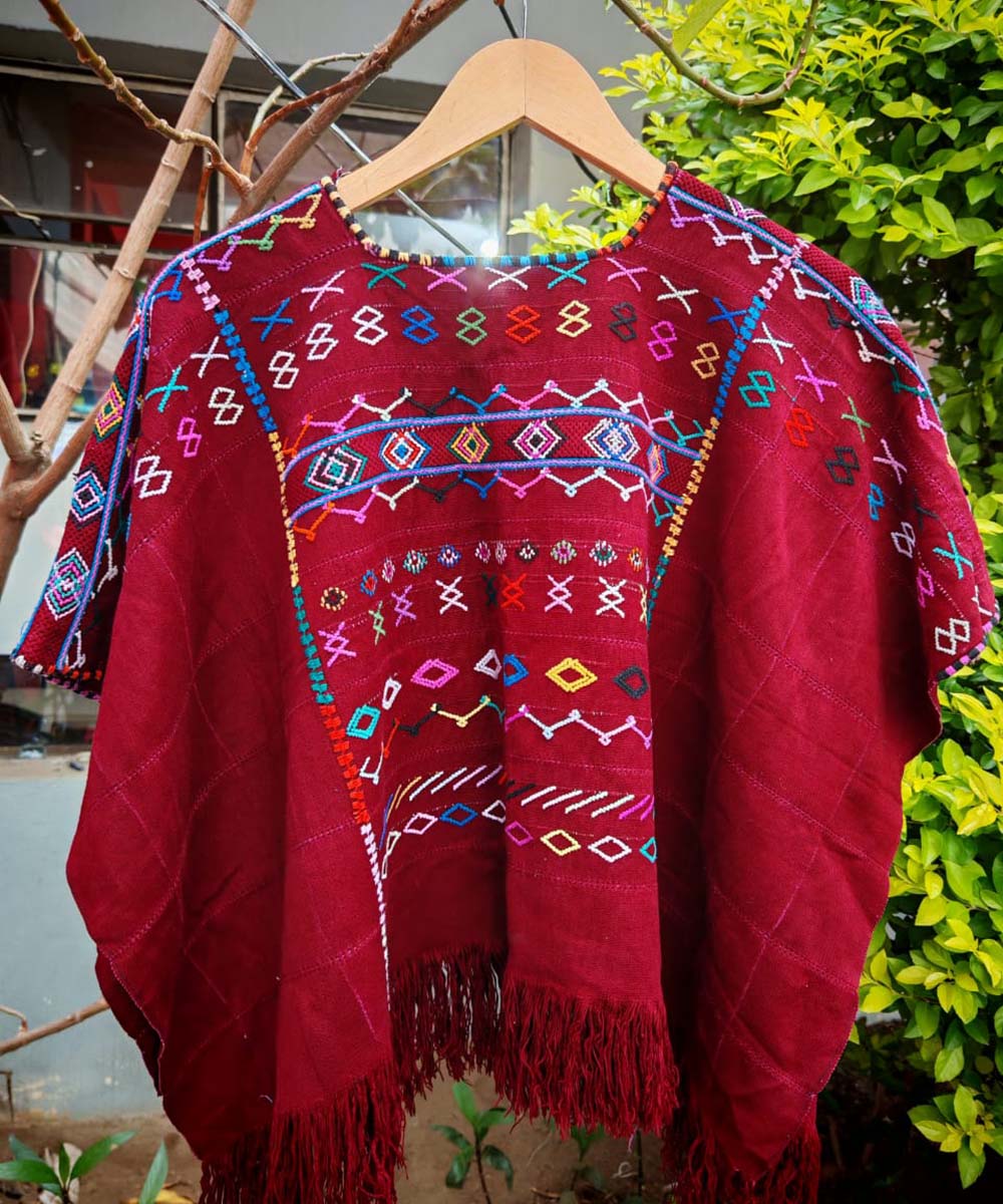 Colorful on red Colotenango huipil