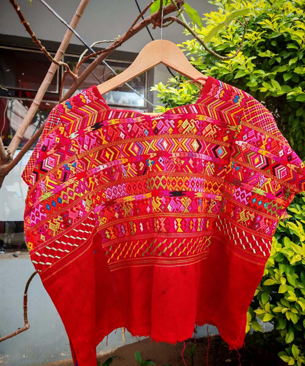 Bright red San Juan Cotzal huipil