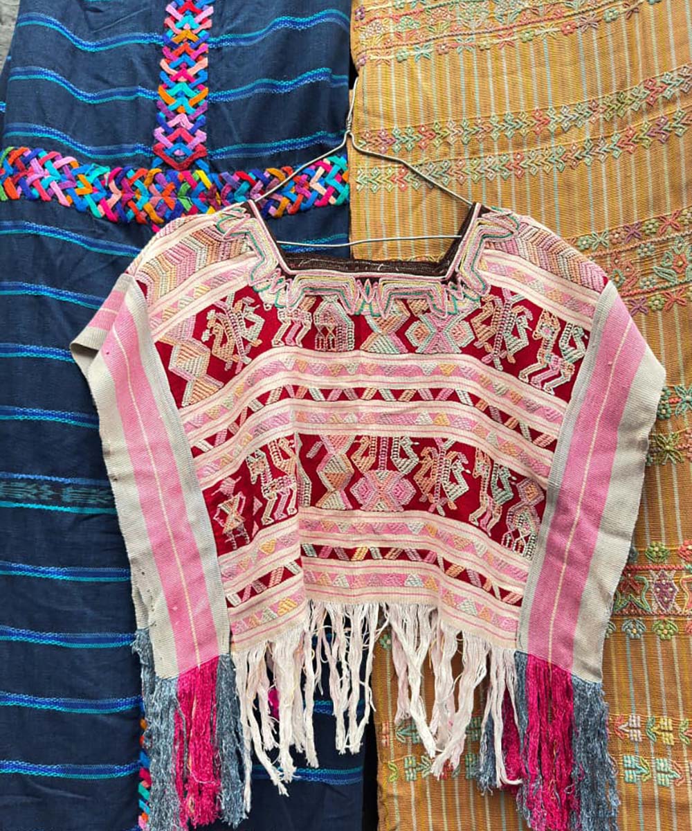 Playful Nebaj huipil with side panels