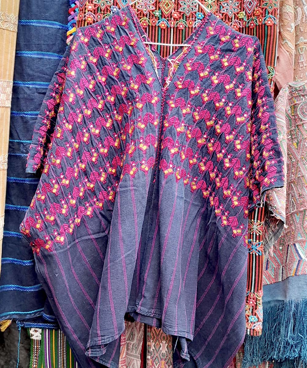 Indigo Nahuala huipil with hot pink chickens