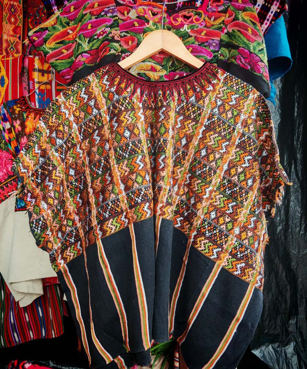 Orange and black zigzag huipil
