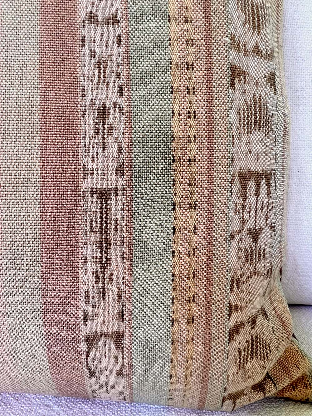 Embroidered Guatemalan huipil textile repurposed into a pillow
