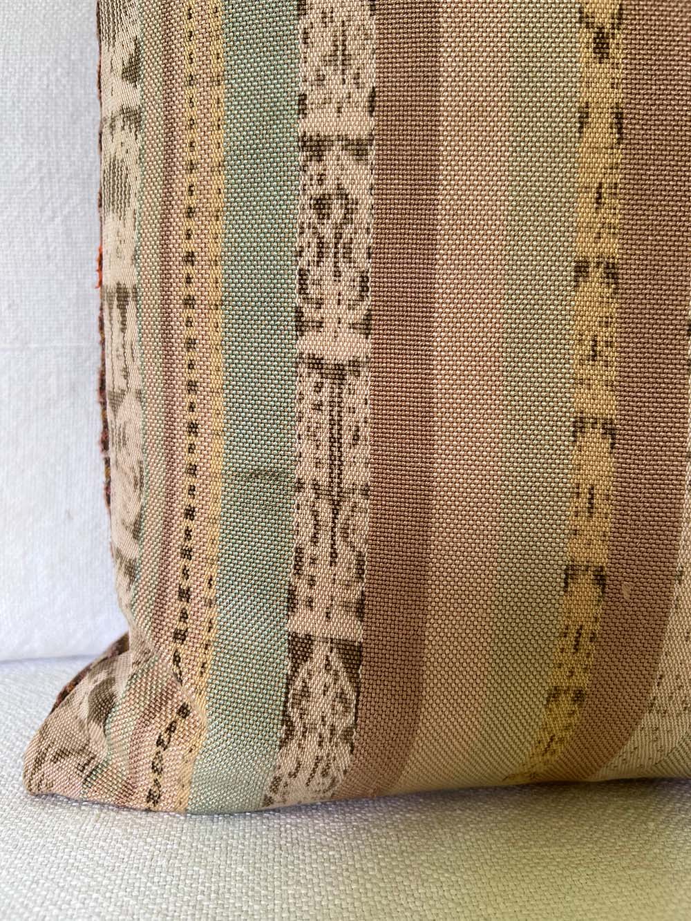 Embroidered Guatemalan huipil textile repurposed into a pillow
