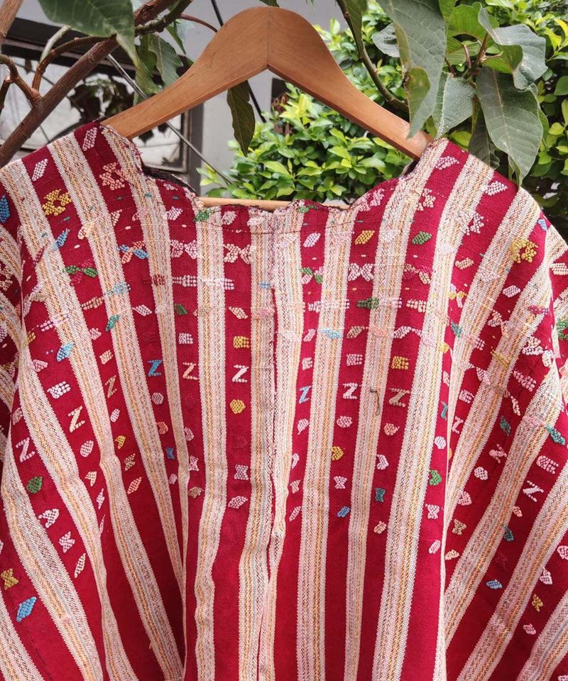 Red and cream striped Colotenango huipil