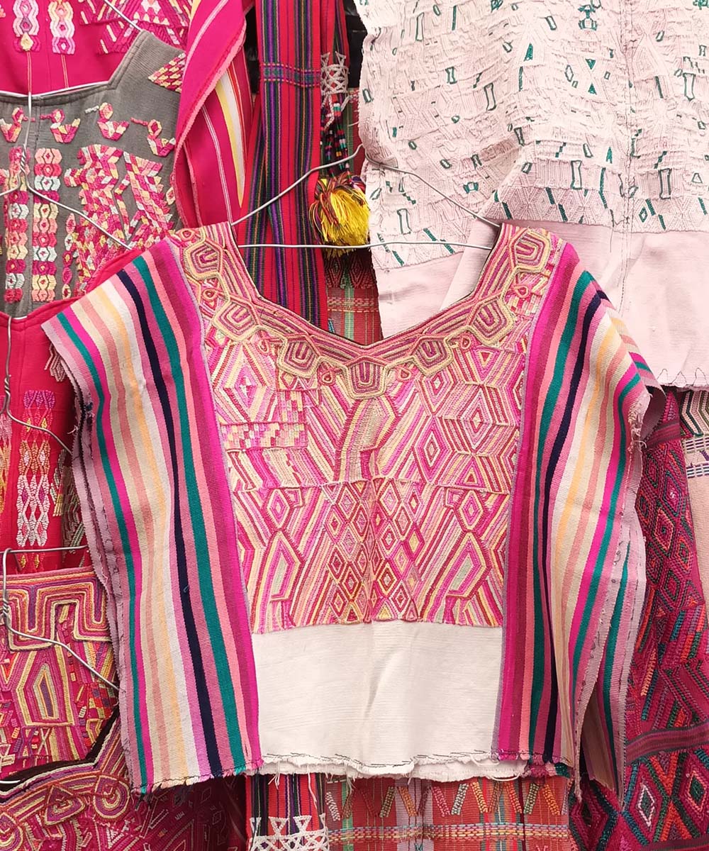 Pink and gold Nebaj huipil