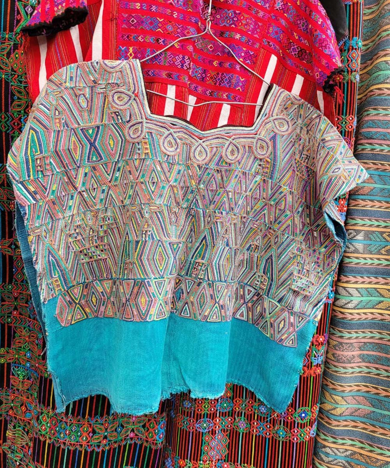 Colorful on sky blue Nebaj huipil