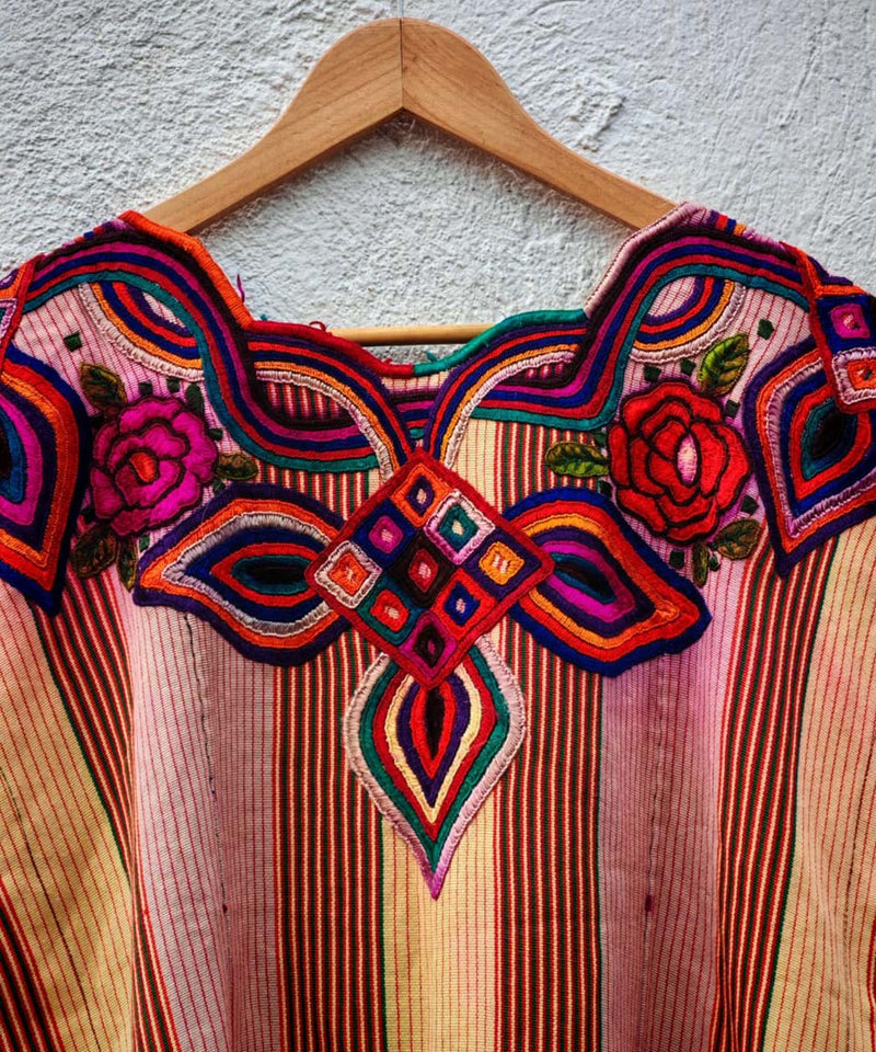 Pink and primrose huipil with bold neckline