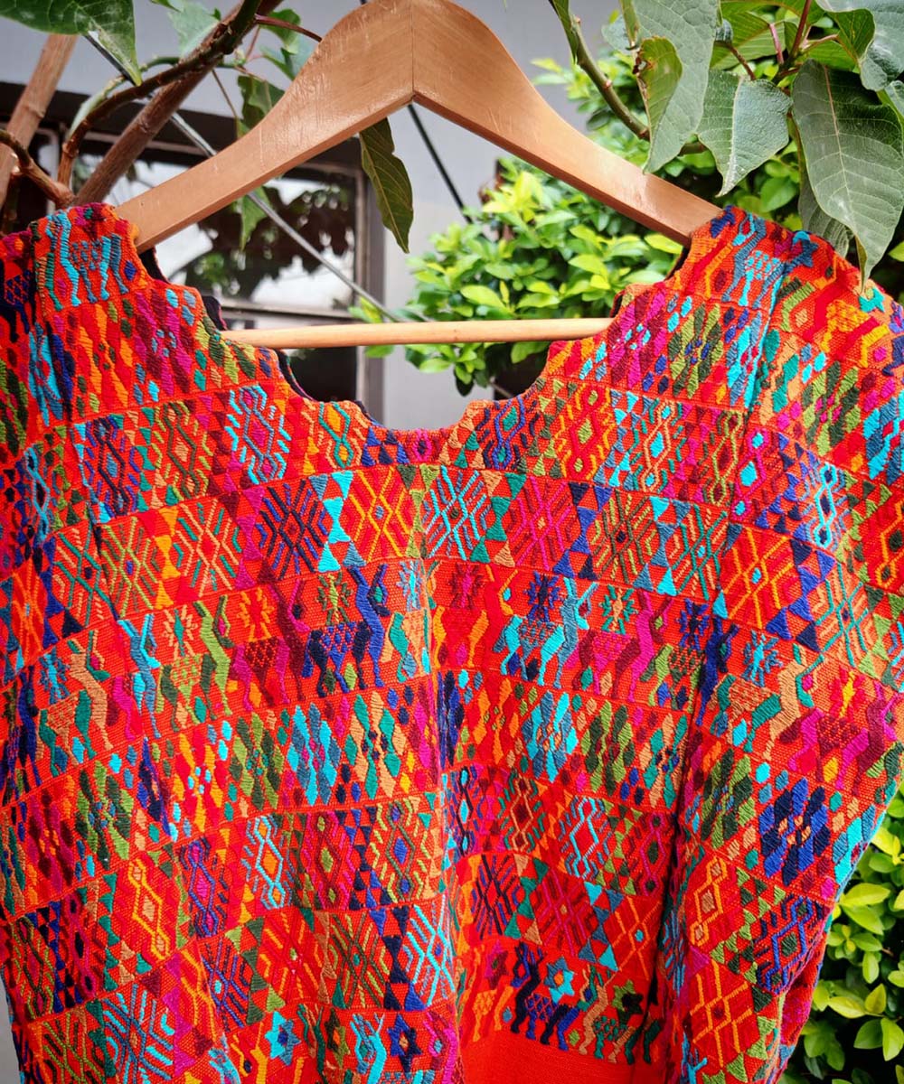 Colorful orange Coban huipil