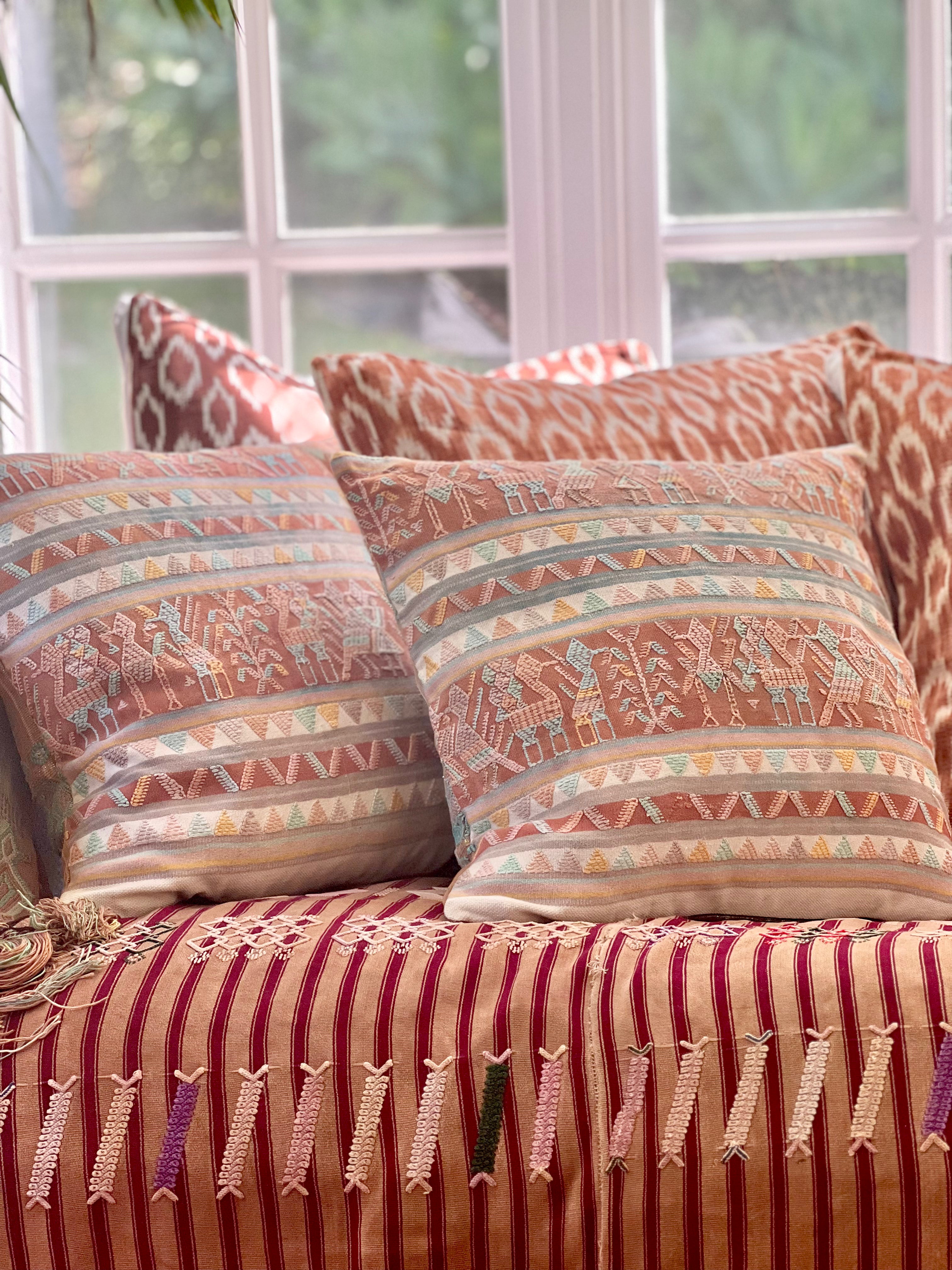 Embroidered Guatemalan huipil textile repurposed into a pillow