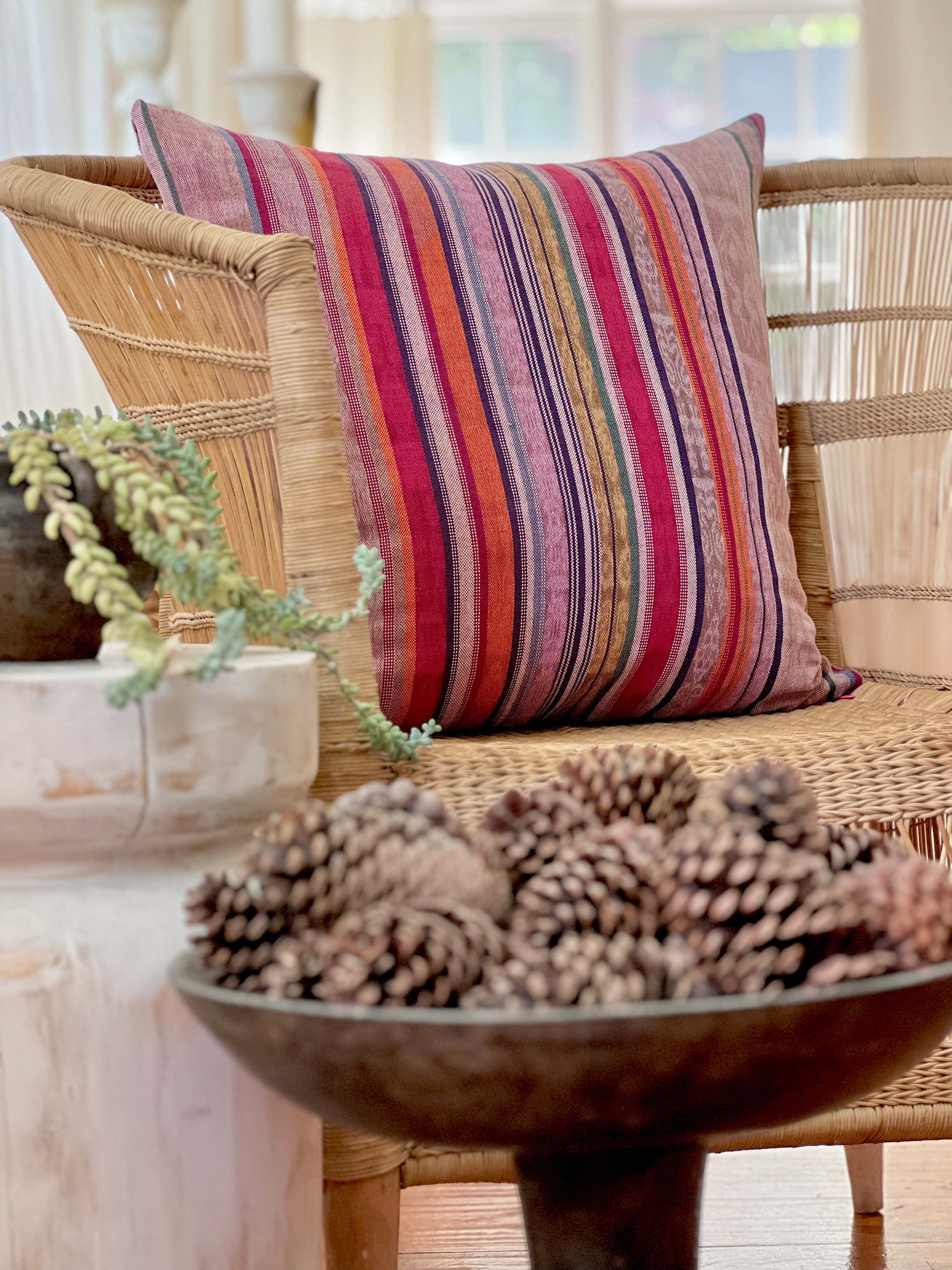 Embroidered Guatemalan huipil textile repurposed into a pillow