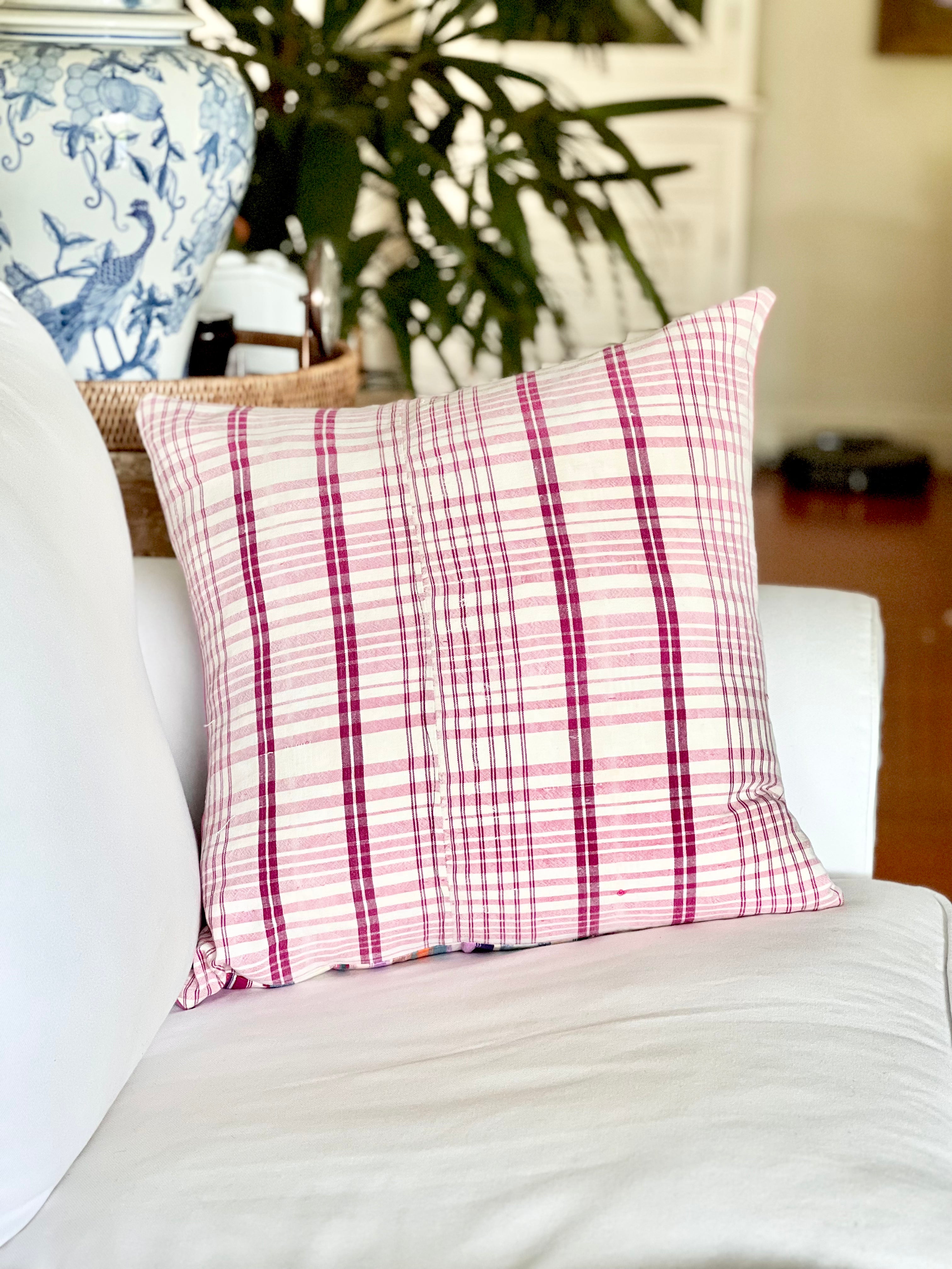 Embroidered Guatemalan huipil textile repurposed into a pillow
