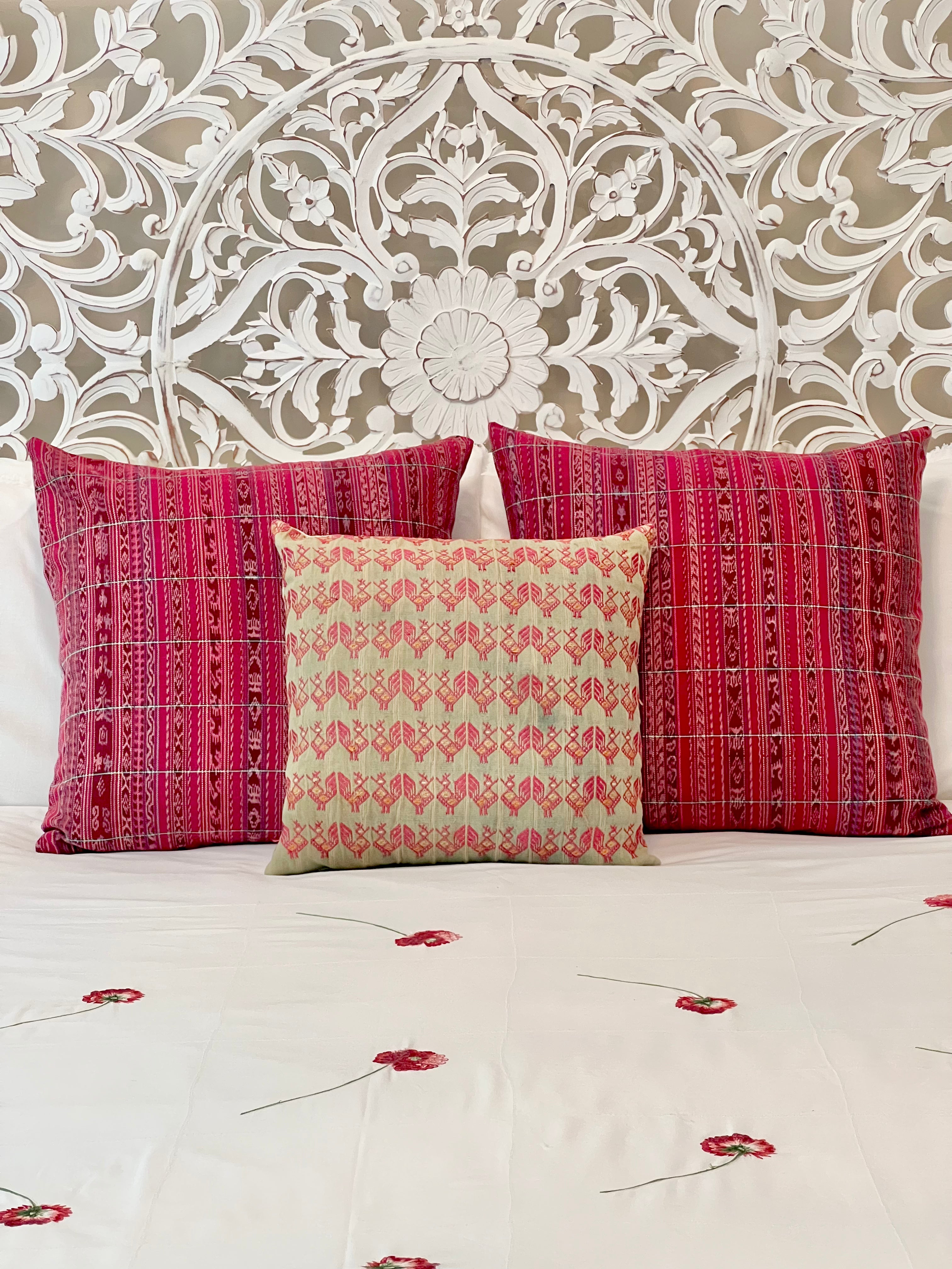Embroidered Guatemalan huipil textile repurposed into a pillow
