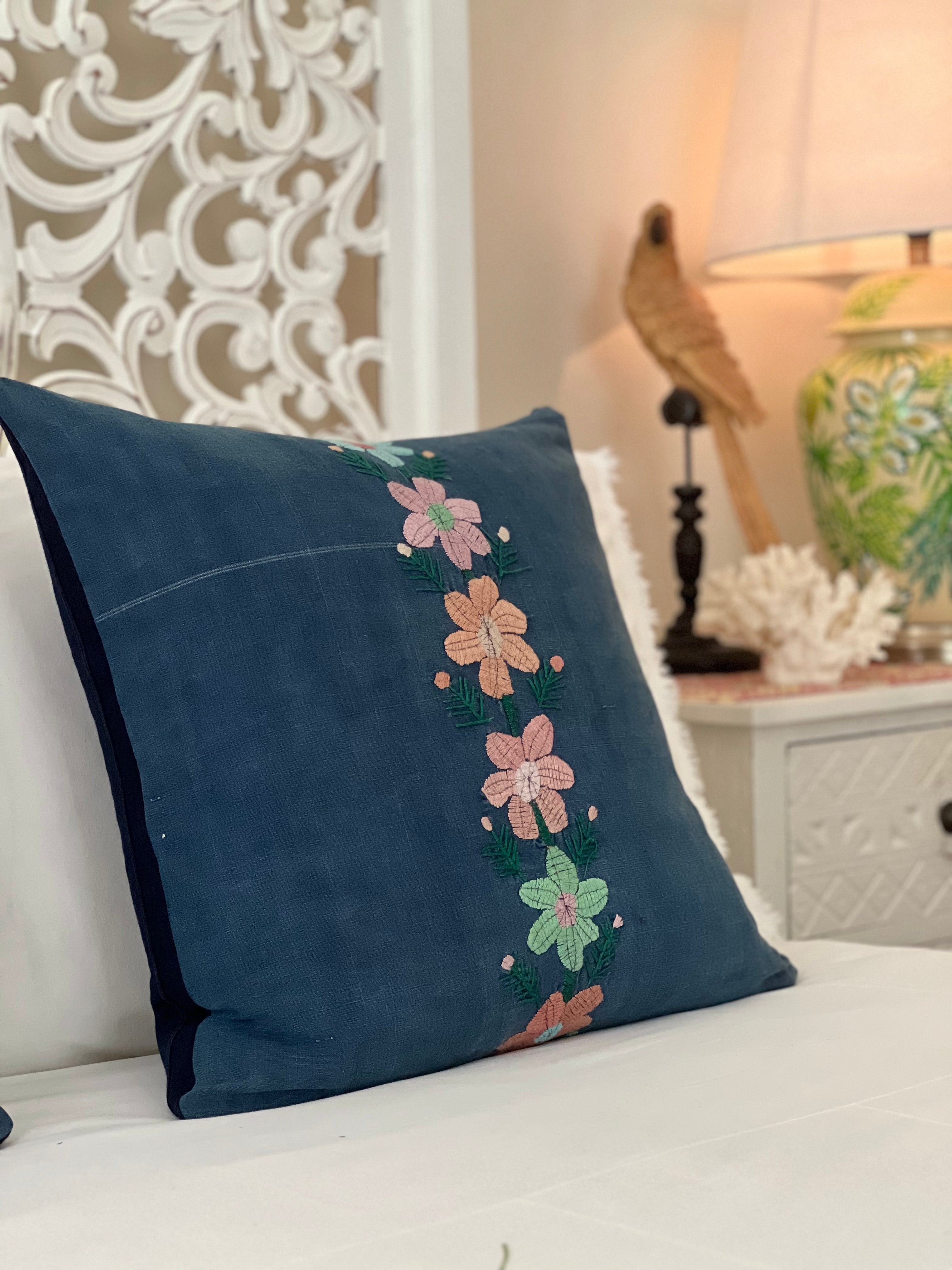 Embroidered Guatemalan huipil textile repurposed into a pillow