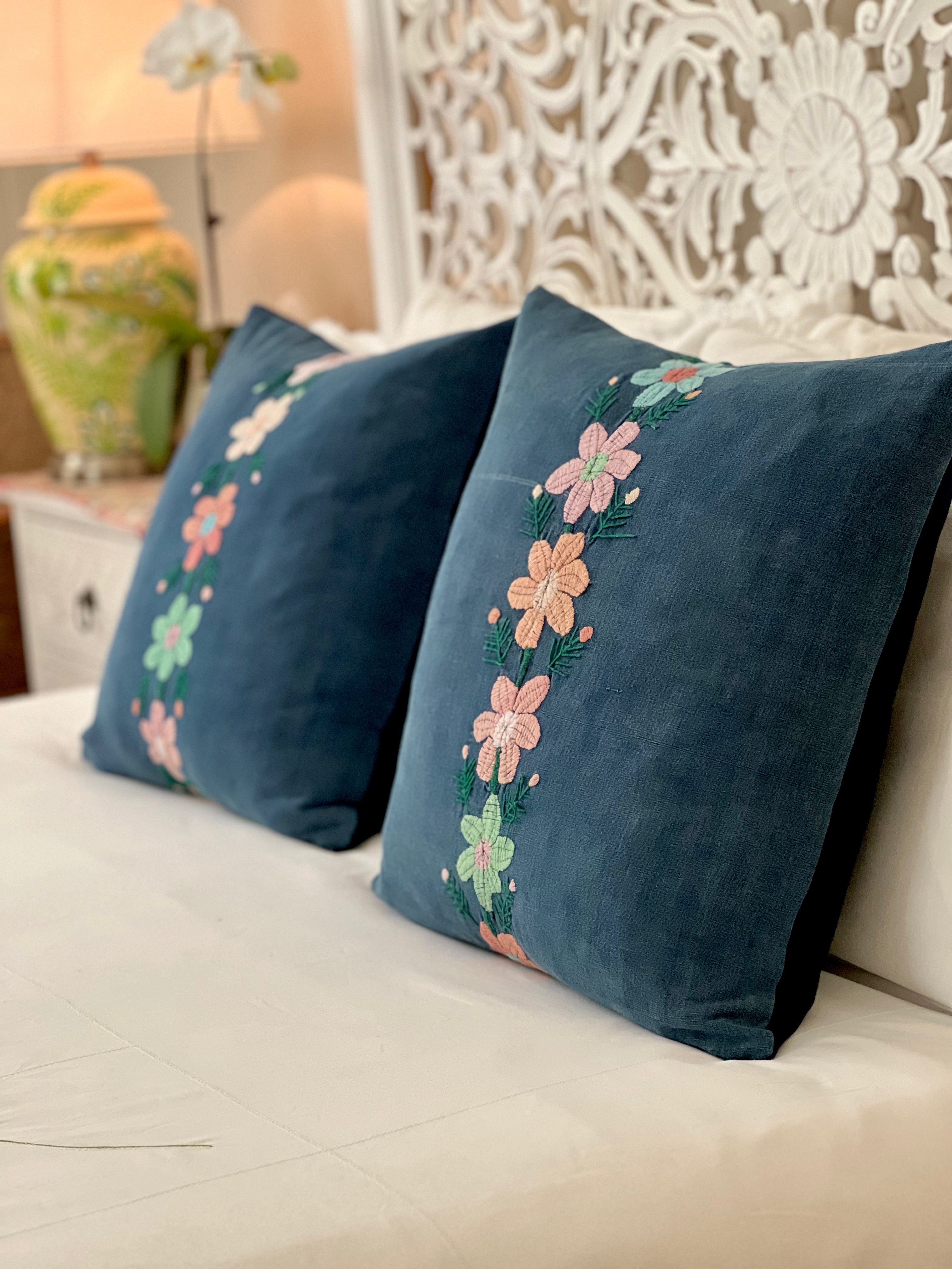 Embroidered Guatemalan huipil textile repurposed into a pillow