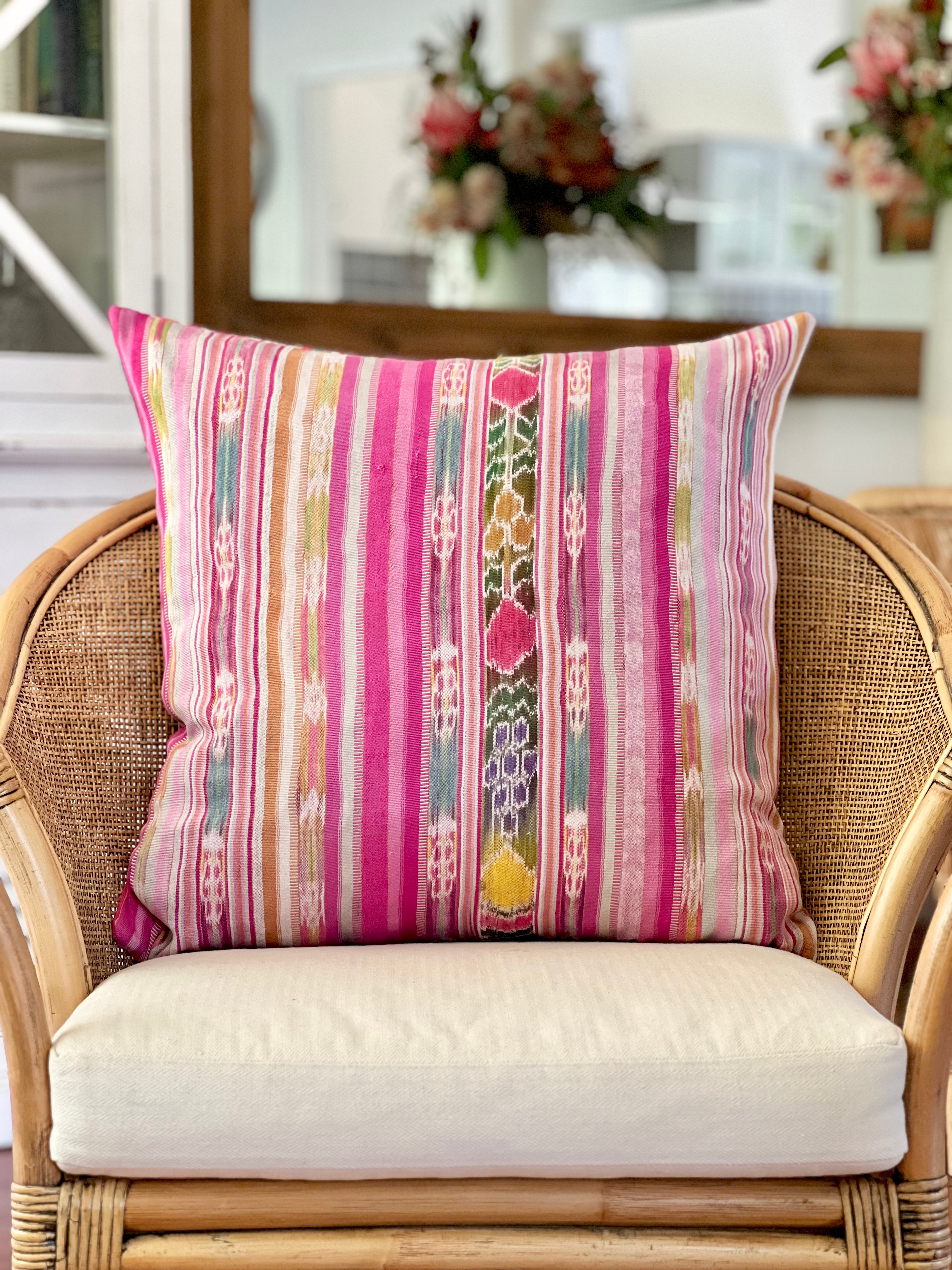 Embroidered Guatemalan huipil textile repurposed into a pillow