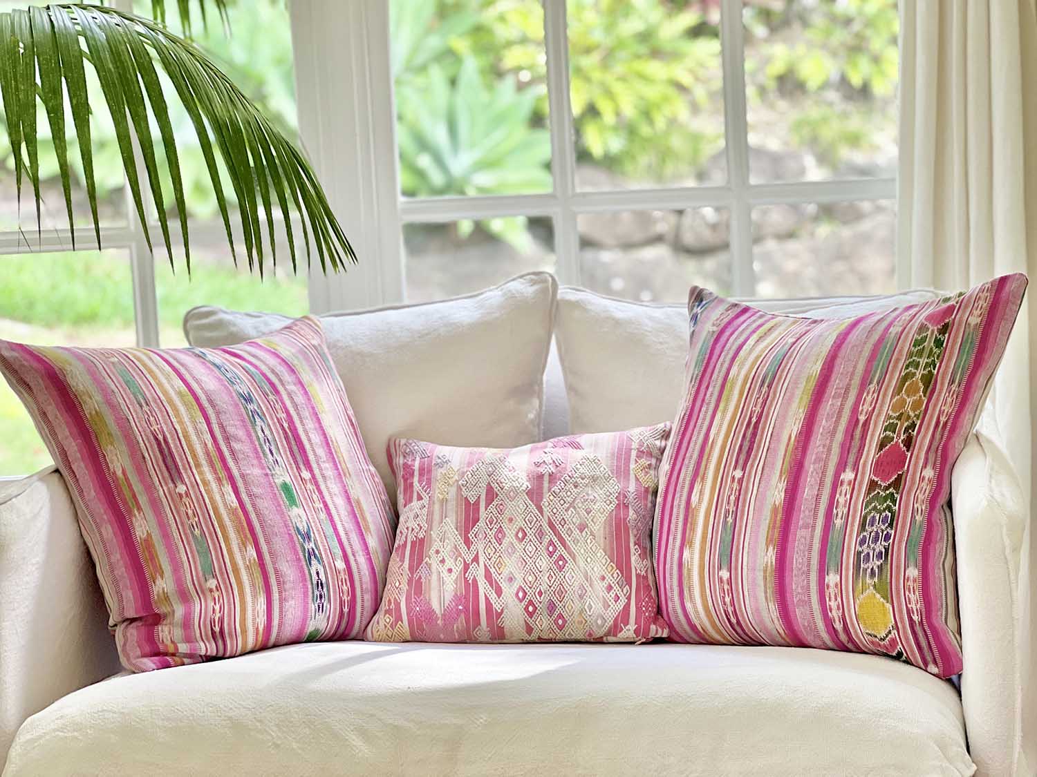 Embroidered Guatemalan huipil textile repurposed into a pillow