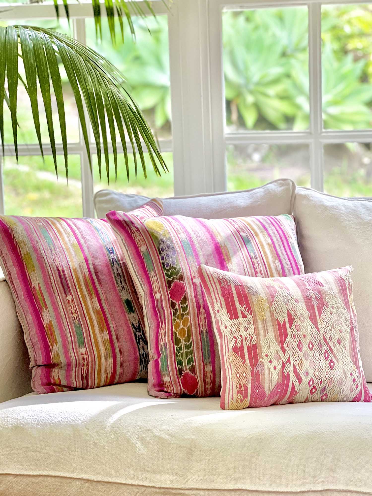Embroidered Guatemalan huipil textile repurposed into a pillow