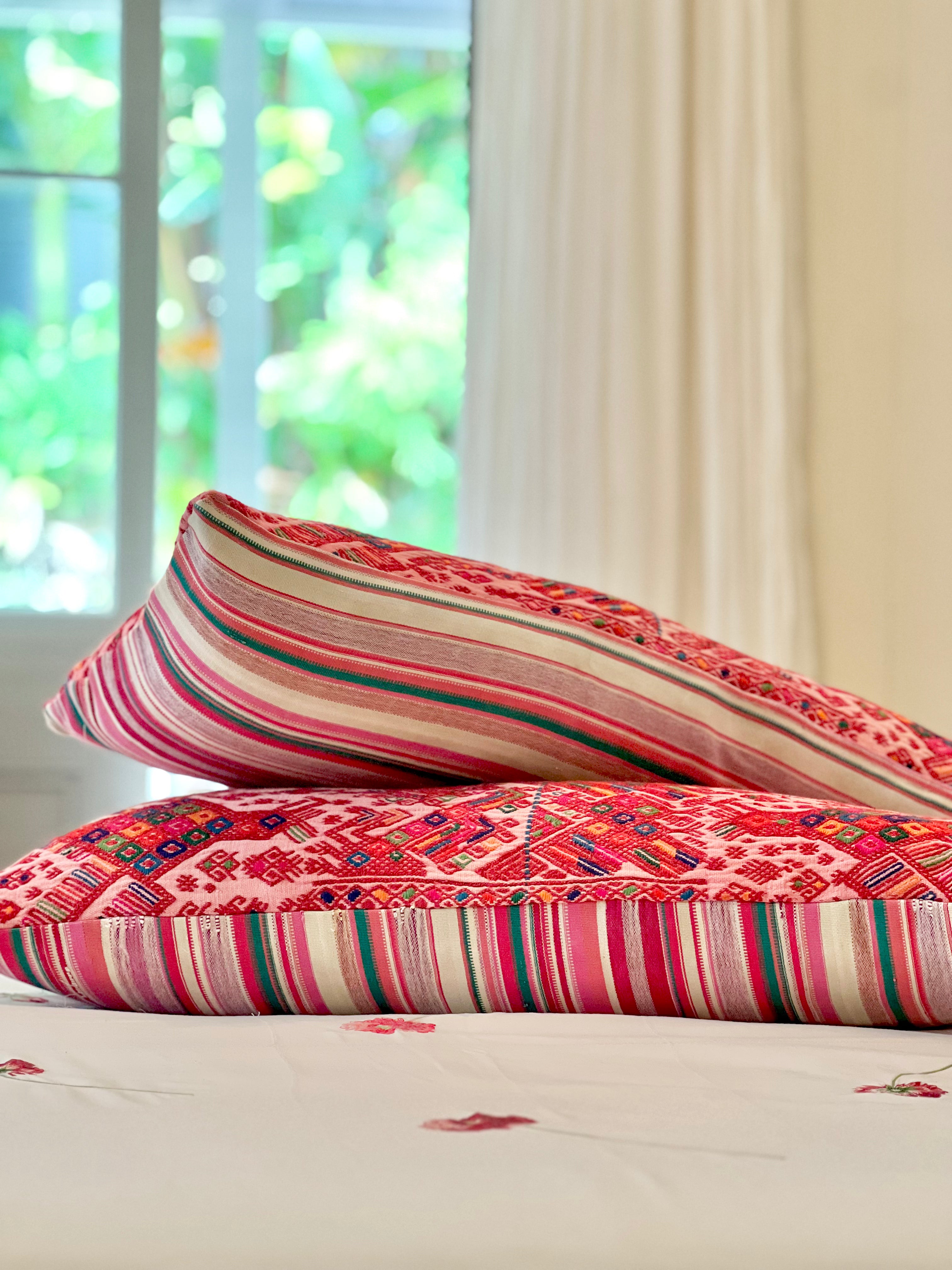 Embroidered Guatemalan huipil textile repurposed into a pillow