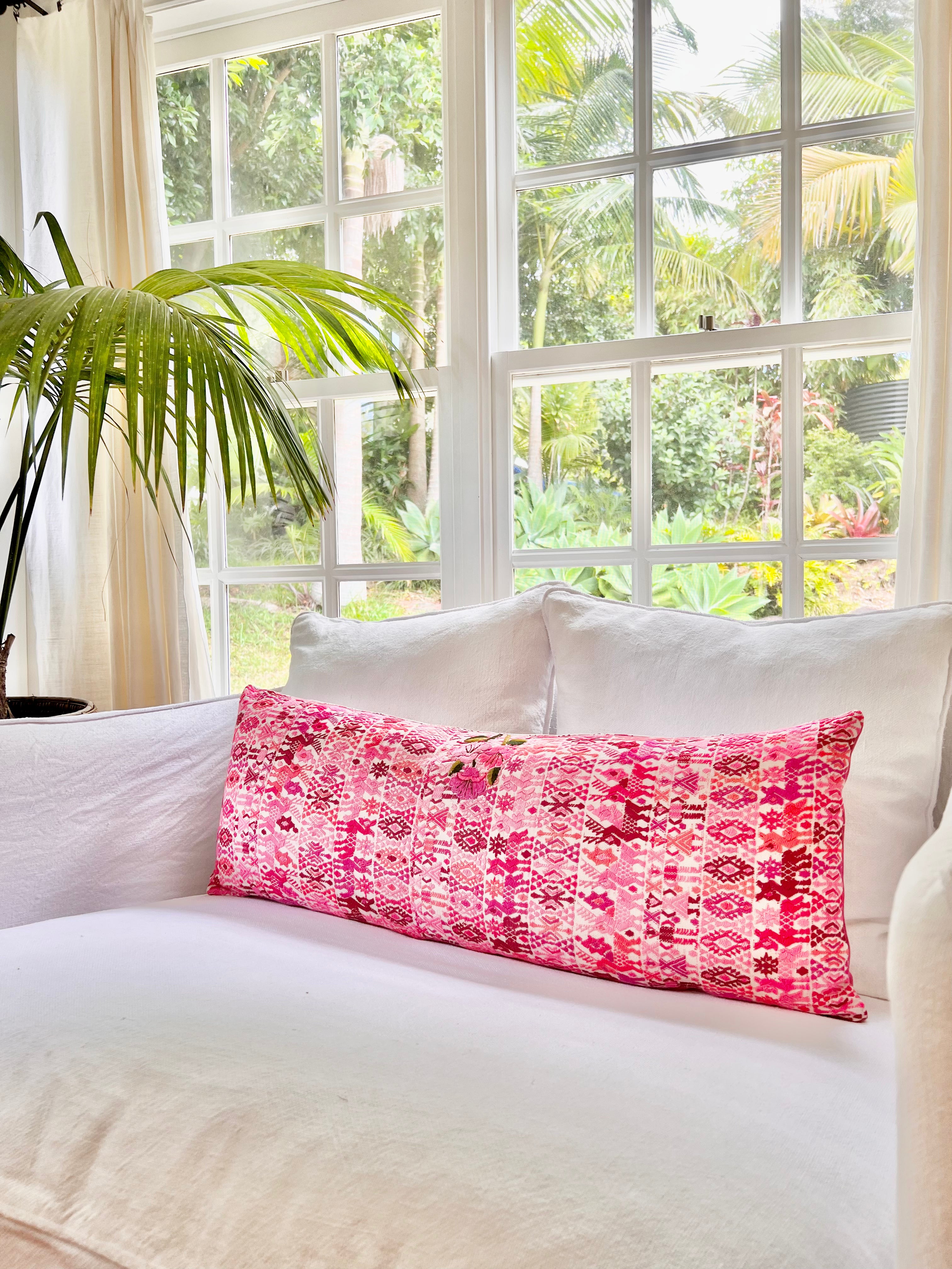 Embroidered Guatemalan huipil textile repurposed into a pillow