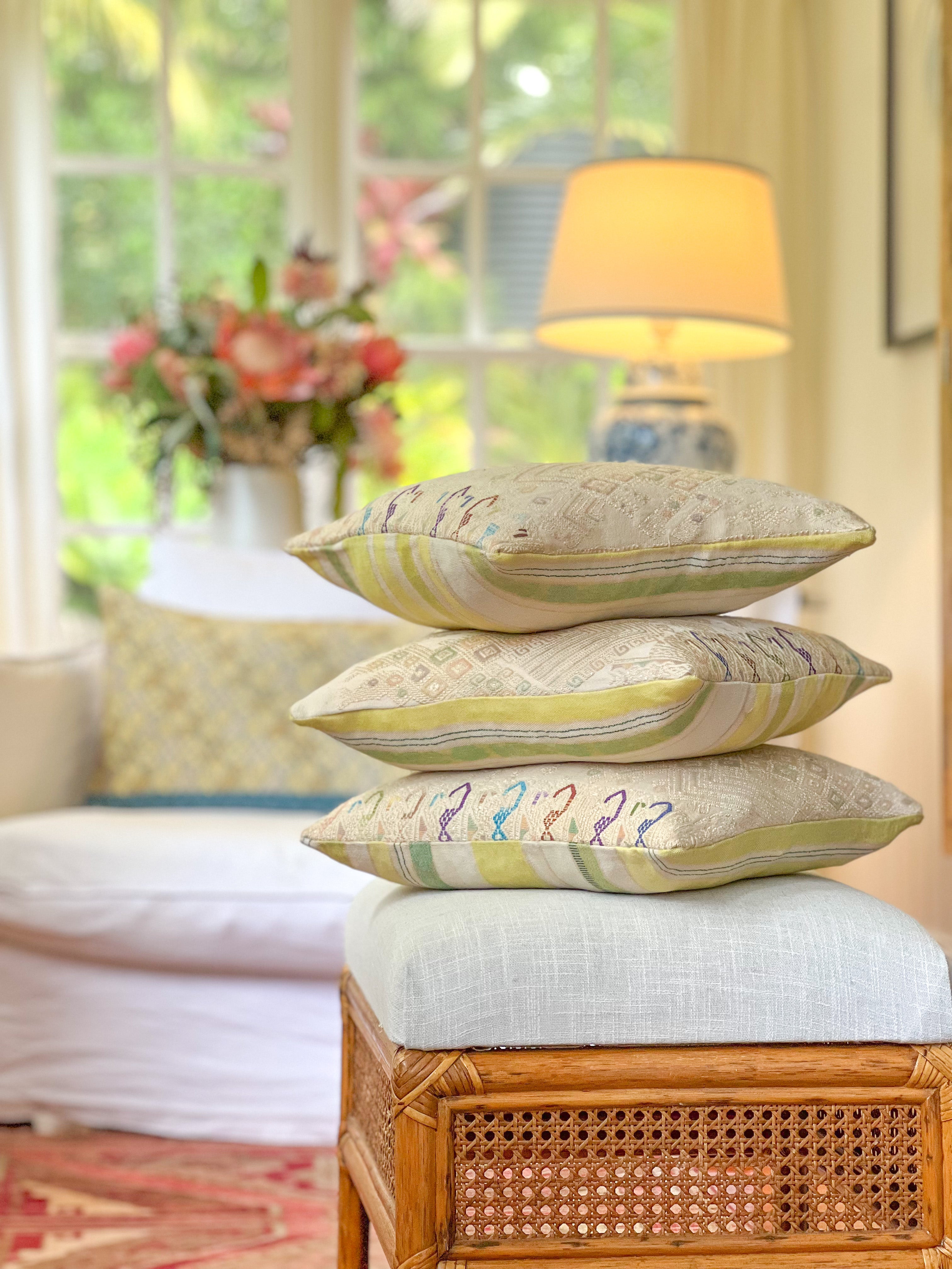 Embroidered Guatemalan huipil textile repurposed into a pillow