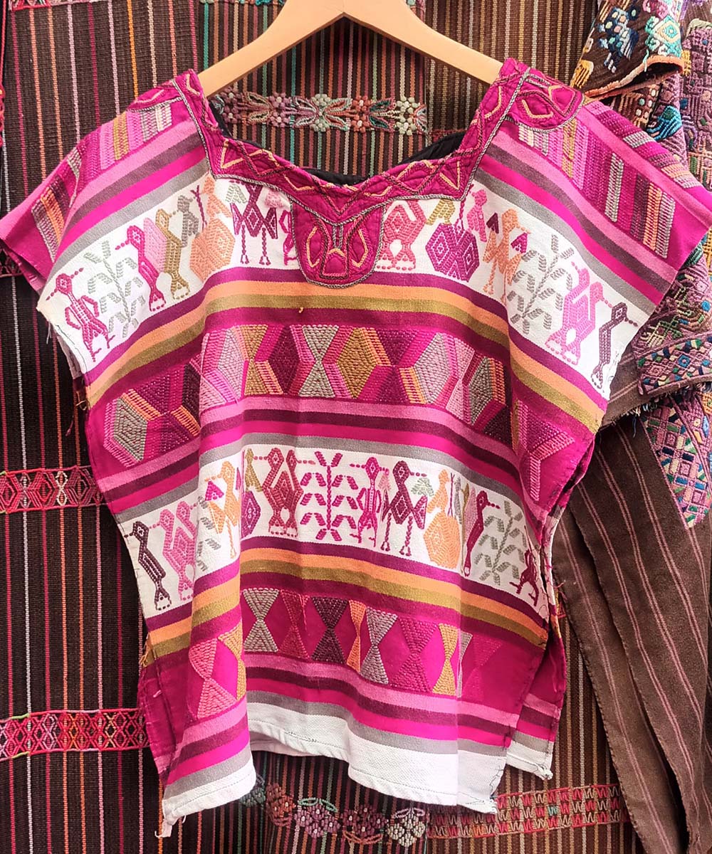 Playful pink and white Nebaj huipil