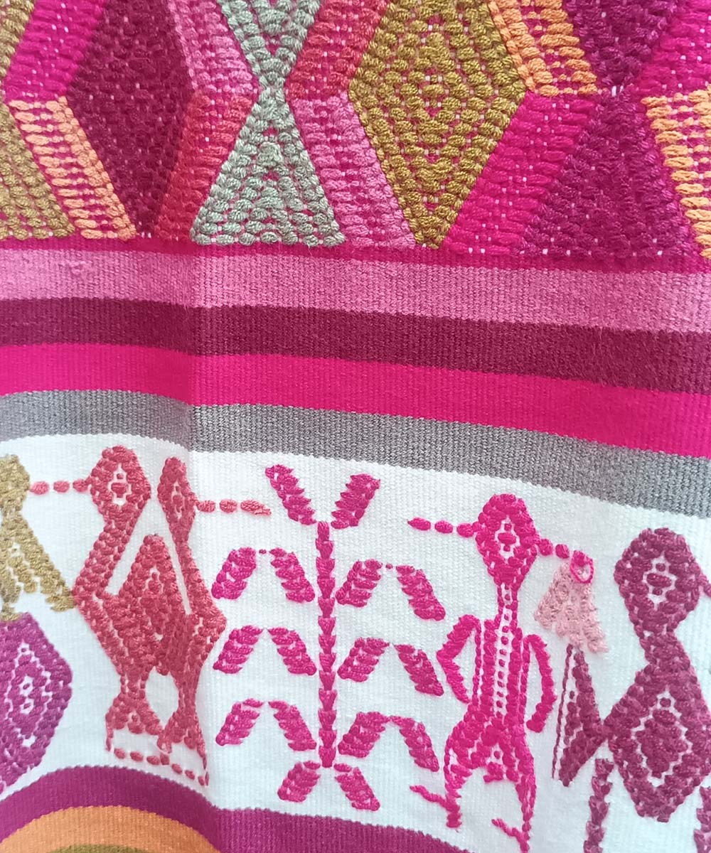 Playful pink and white Nebaj huipil