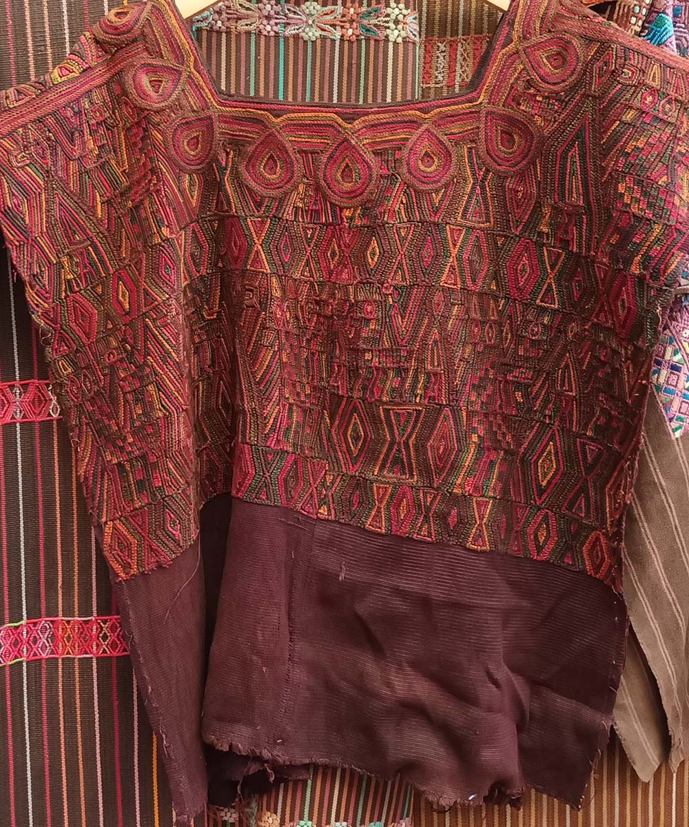 Rich red and brown Nebaj huipil