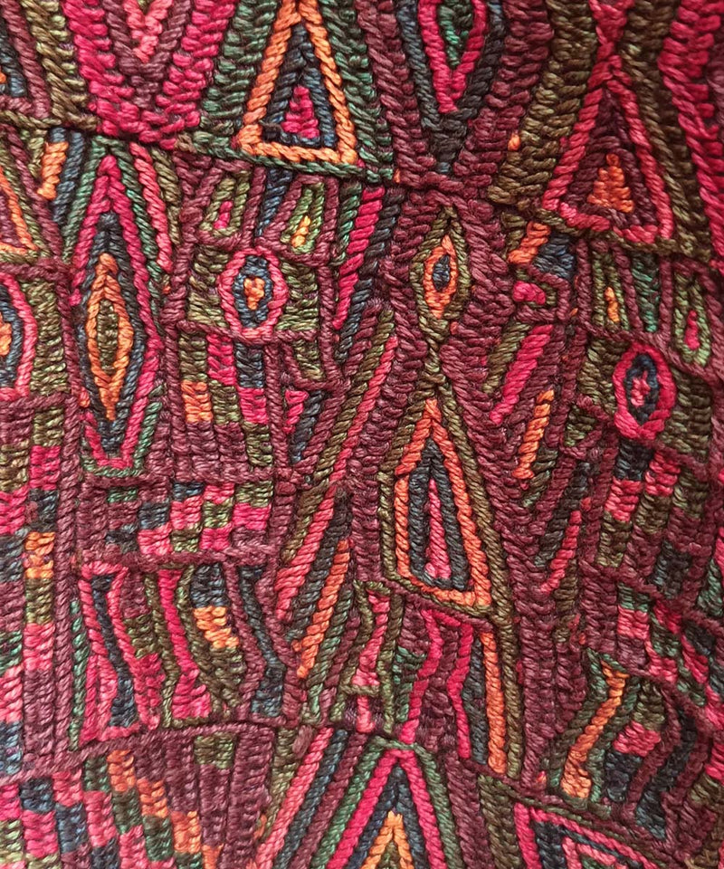 Rich red and brown Nebaj huipil
