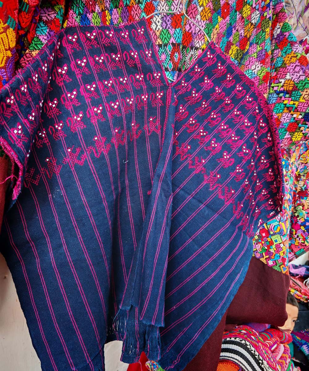 Nahuala huipil with cats and lizards