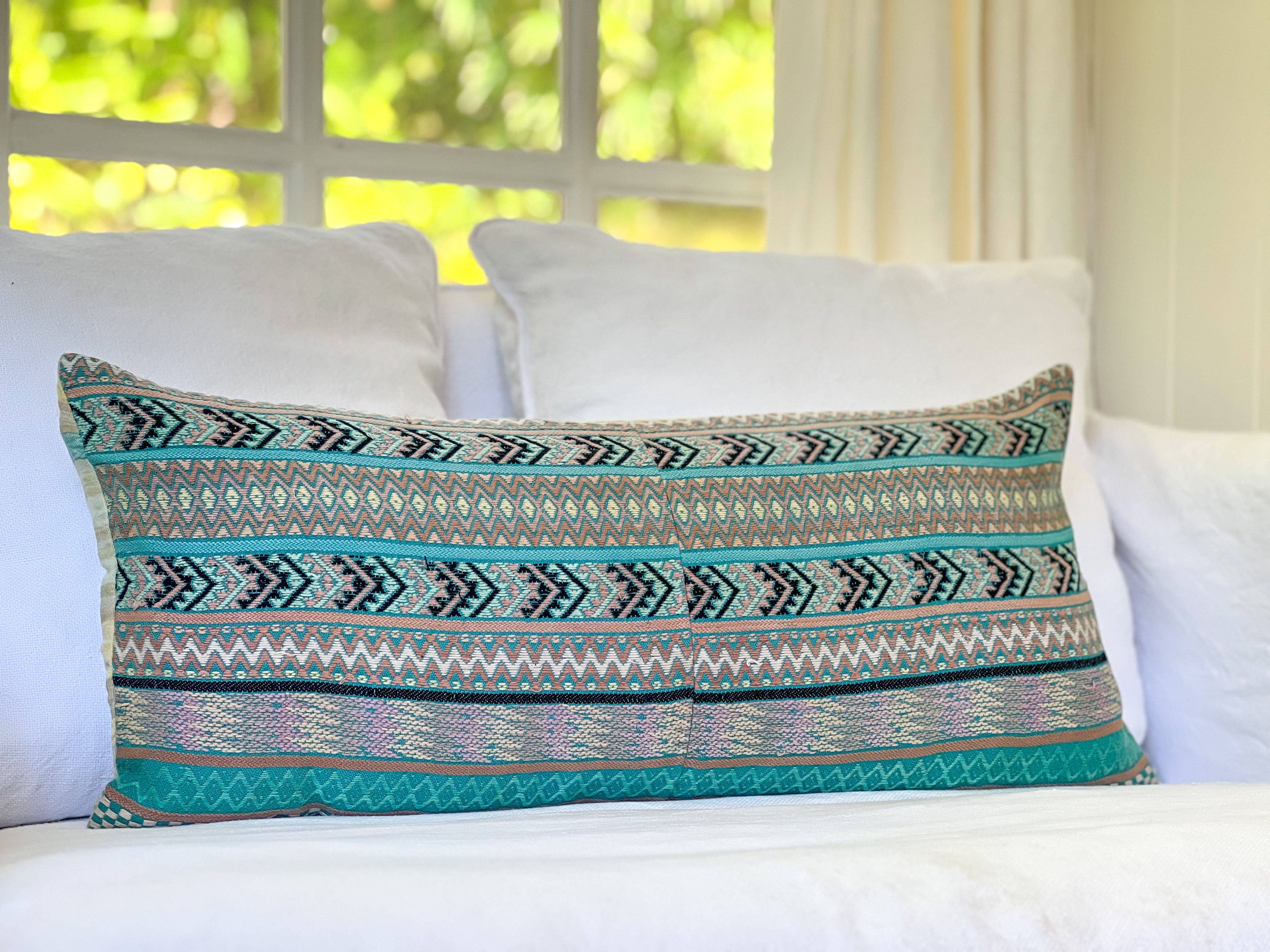 Embroidered Guatemalan huipil textile repurposed into a pillow