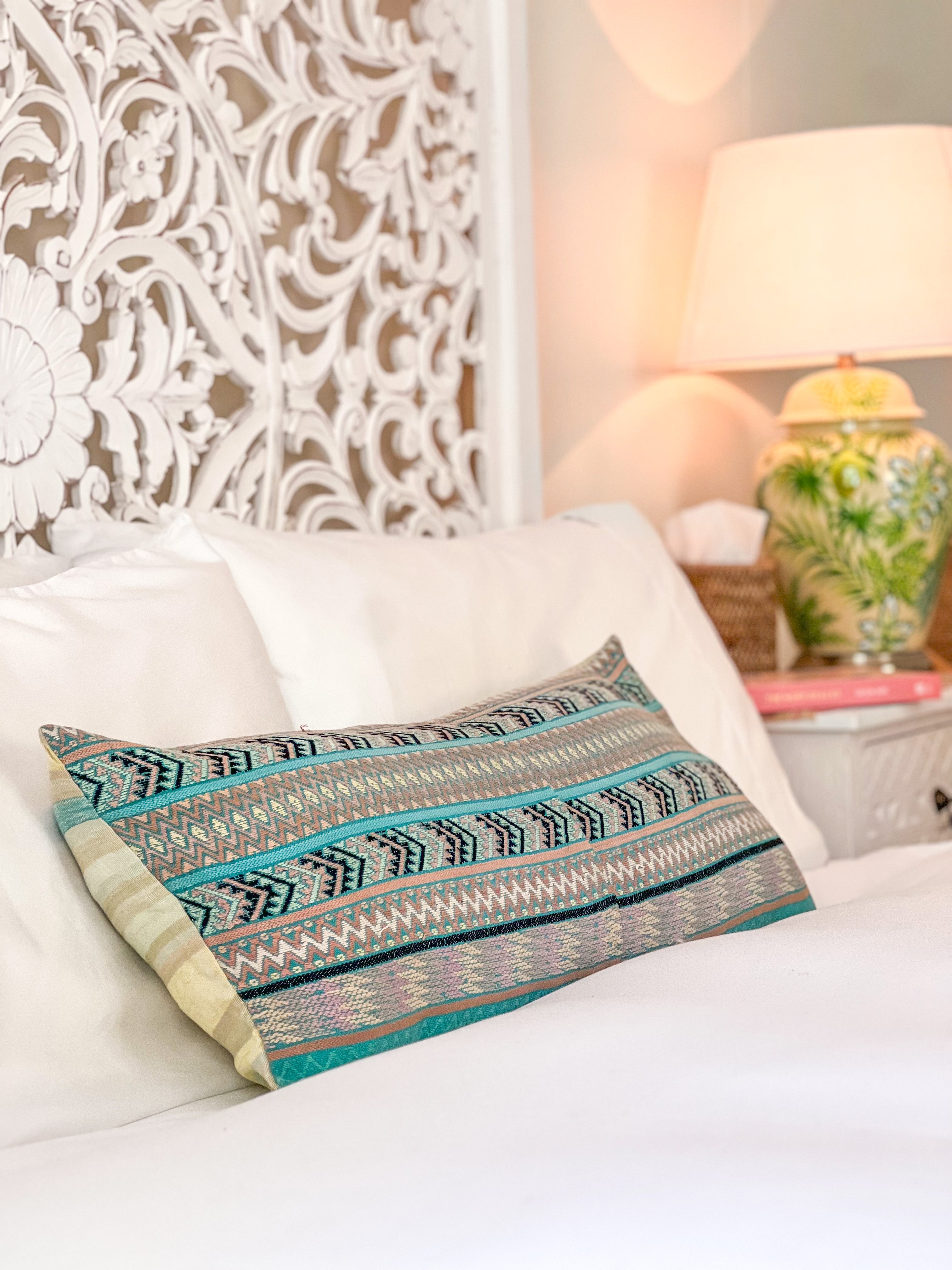 Embroidered Guatemalan huipil textile repurposed into a pillow