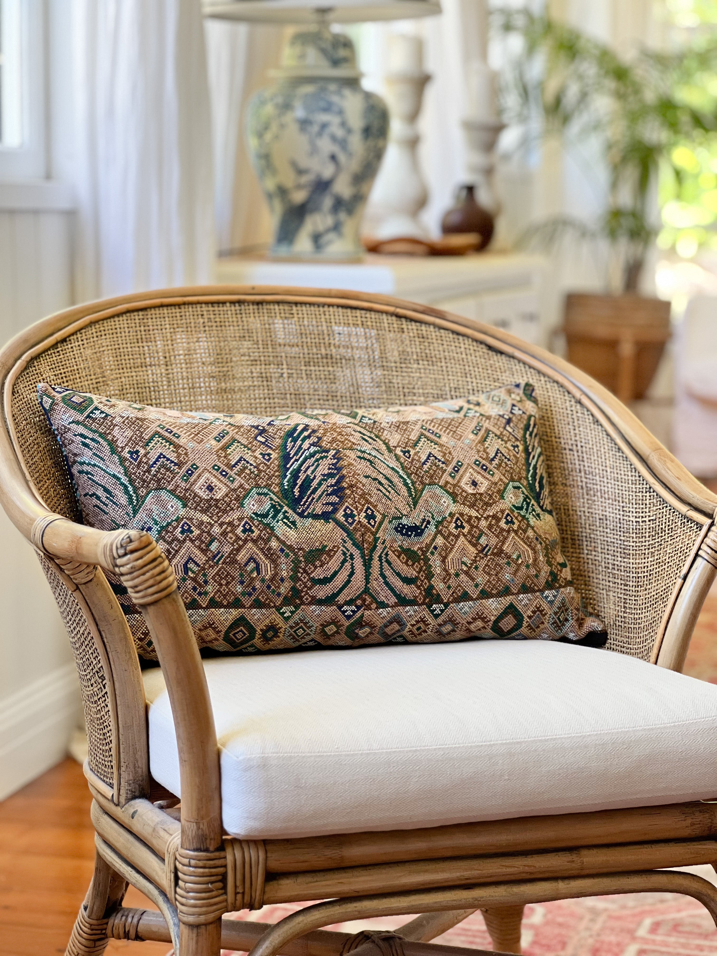 Embroidered Guatemalan huipil textile repurposed into a pillow