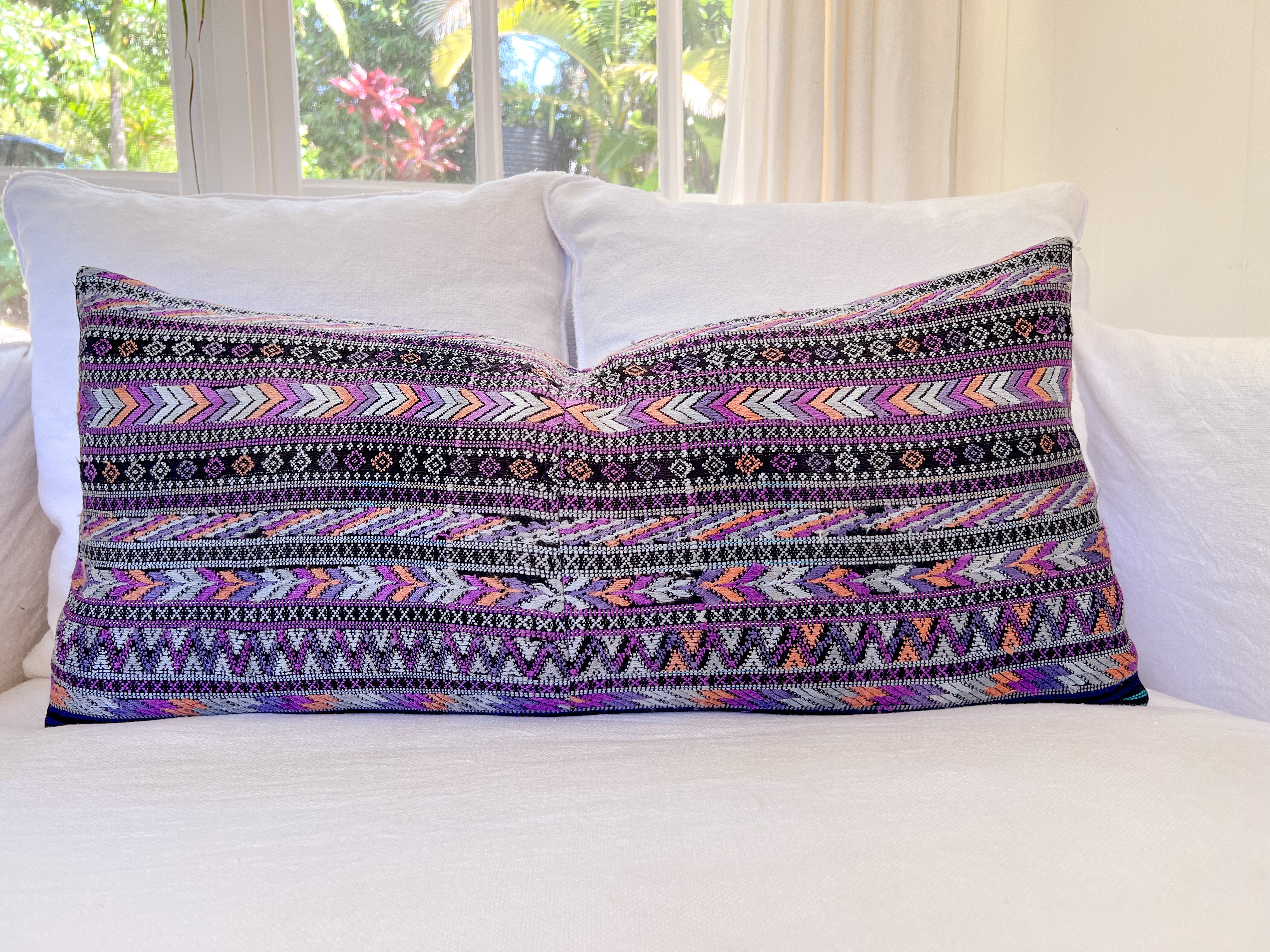 Embroidered Guatemalan huipil textile repurposed into a pillow